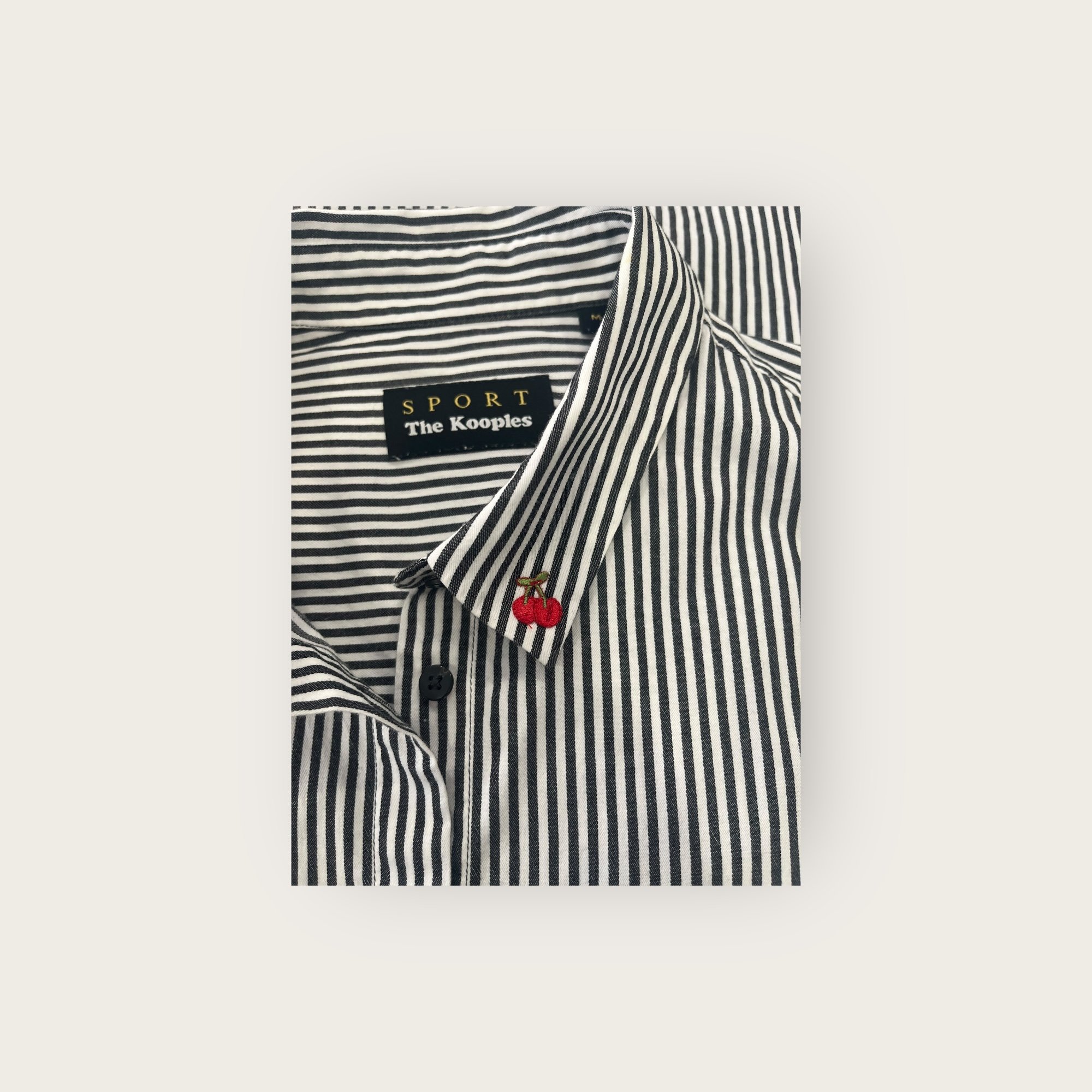 adomimod.com-the-kooples-chemise-rayures-broderies-taille-MPhotoroom_002_20240903_145913.jpg