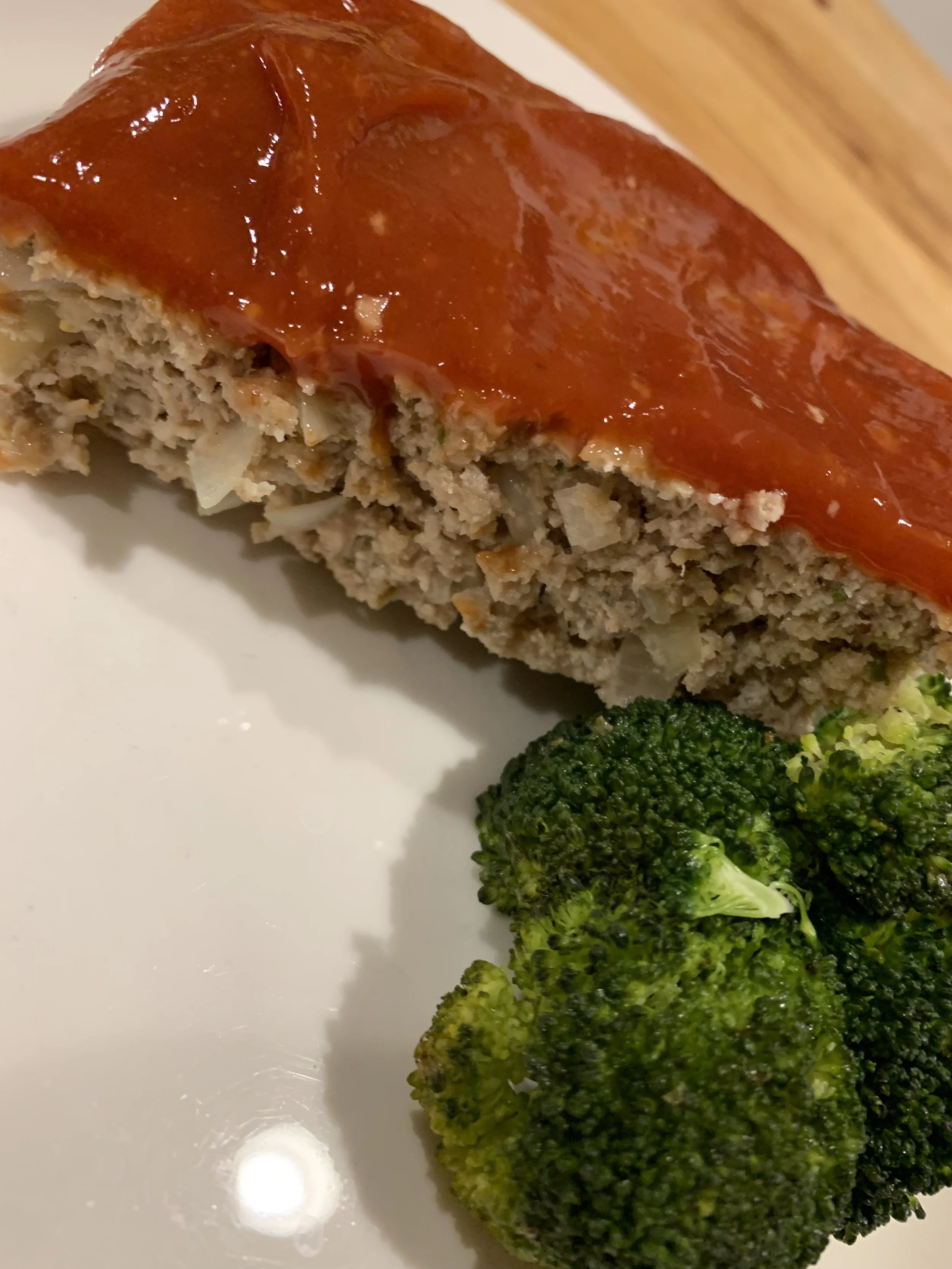 Turkey Meat Loaf with Steamed Broccoli and choice of side.