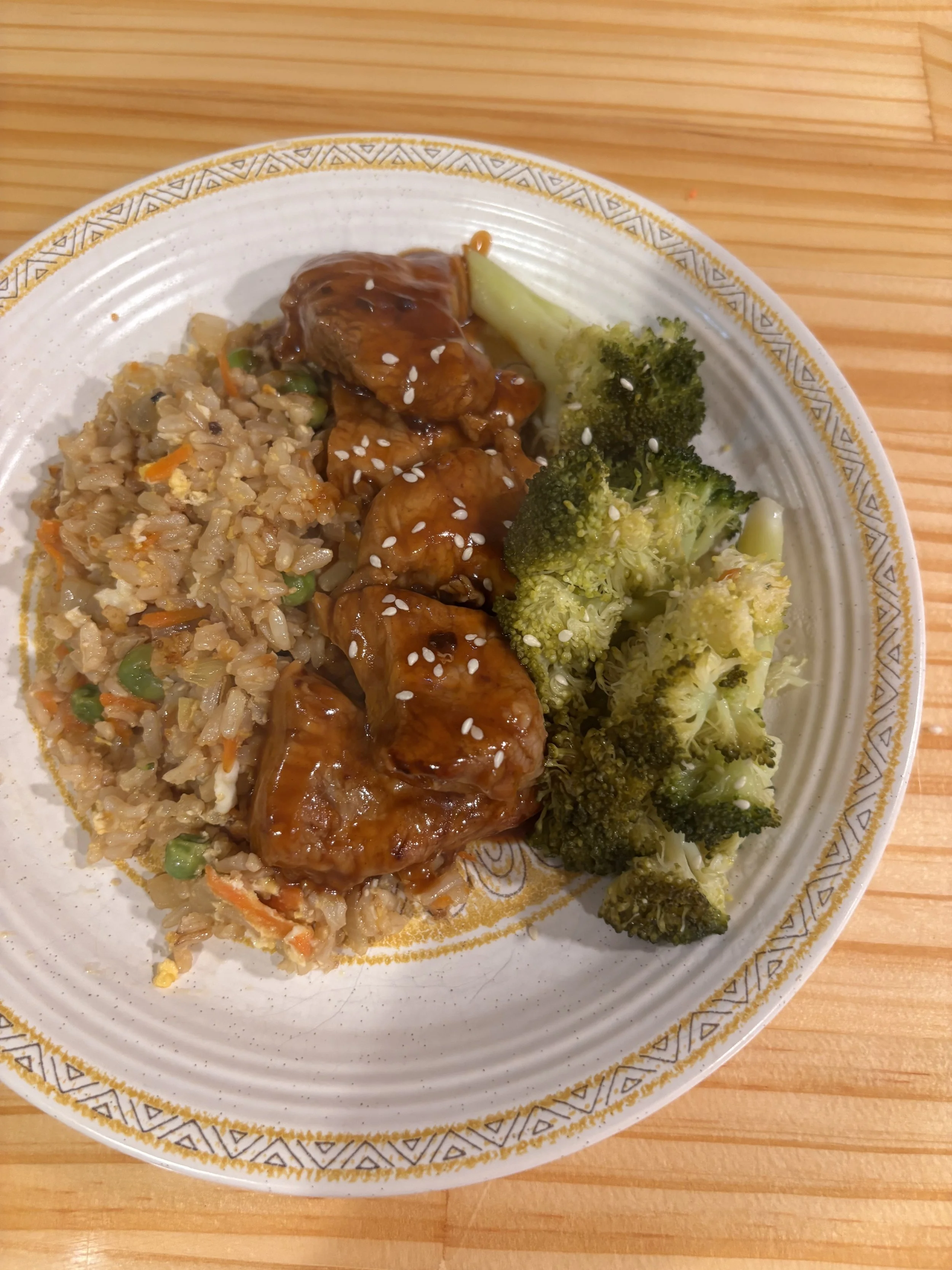 Sweet and Sour Pork served with Broccoli and Fried rice