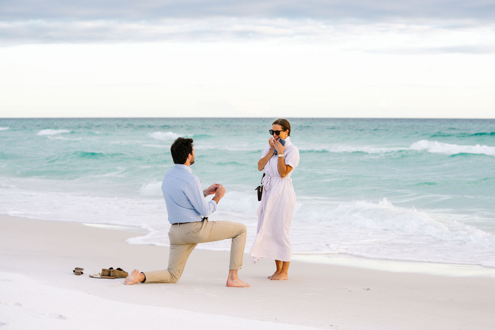 Beach proposal by the ocean