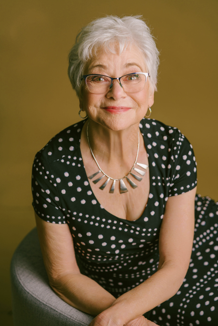 Older woman in a polka-dot dress