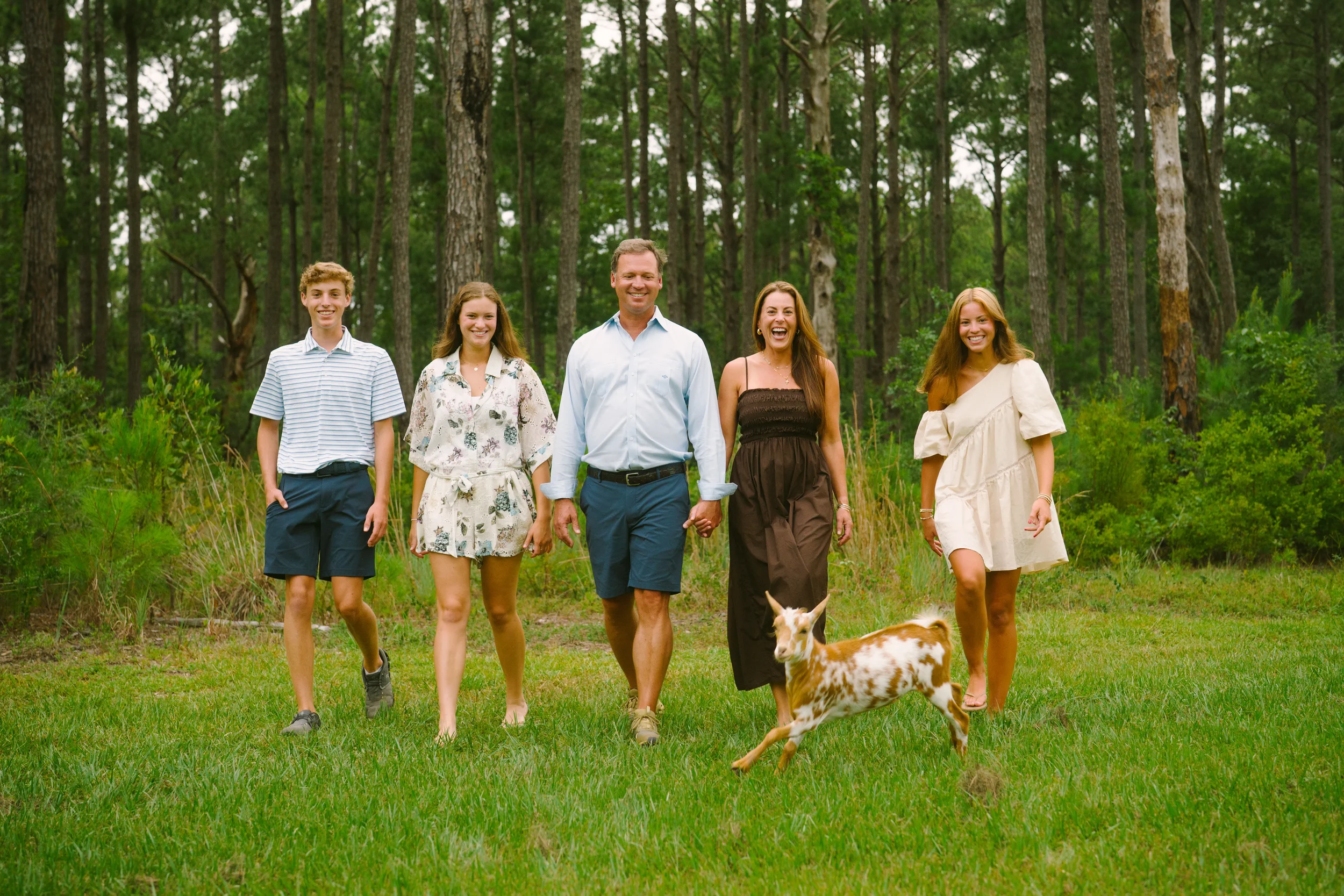 Freeport family photography session featuring a young girl sitting outdoors