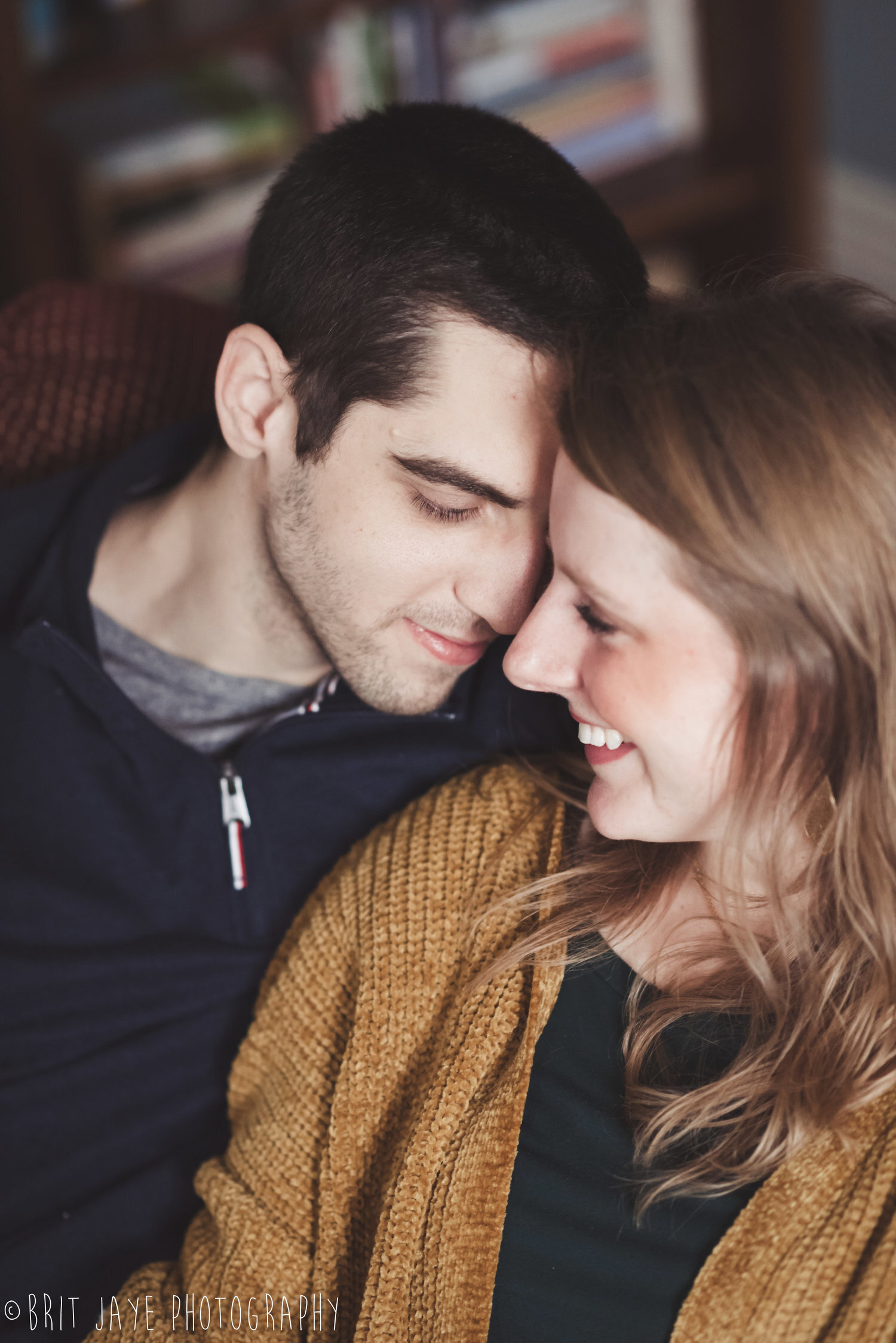 happy young relaxed couple working on laptop computer at modern home indoor  Stock Photo - Alamy