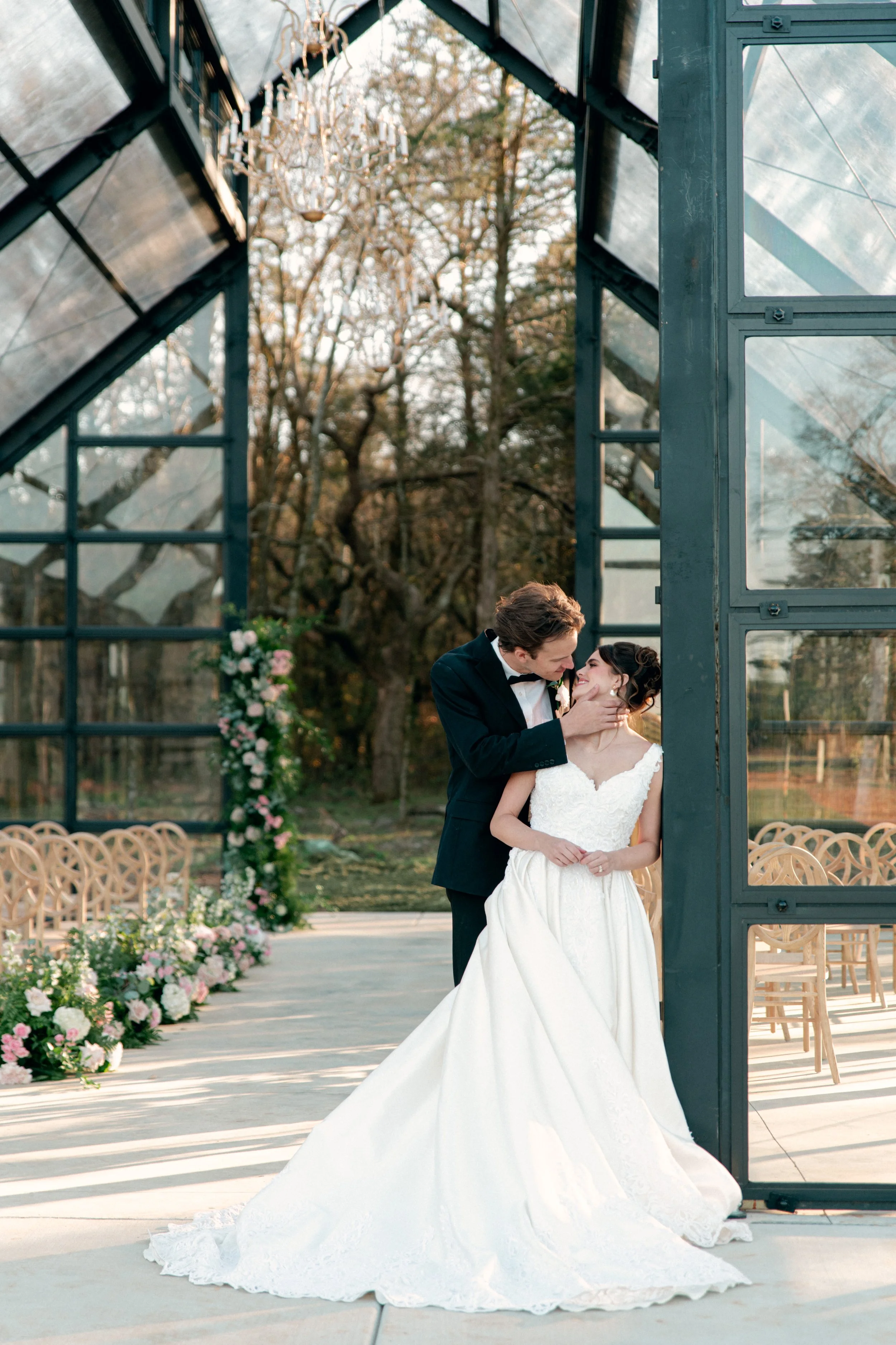 Wedding photos at Jubilee Woods featuring portraits in the Glass Chapel