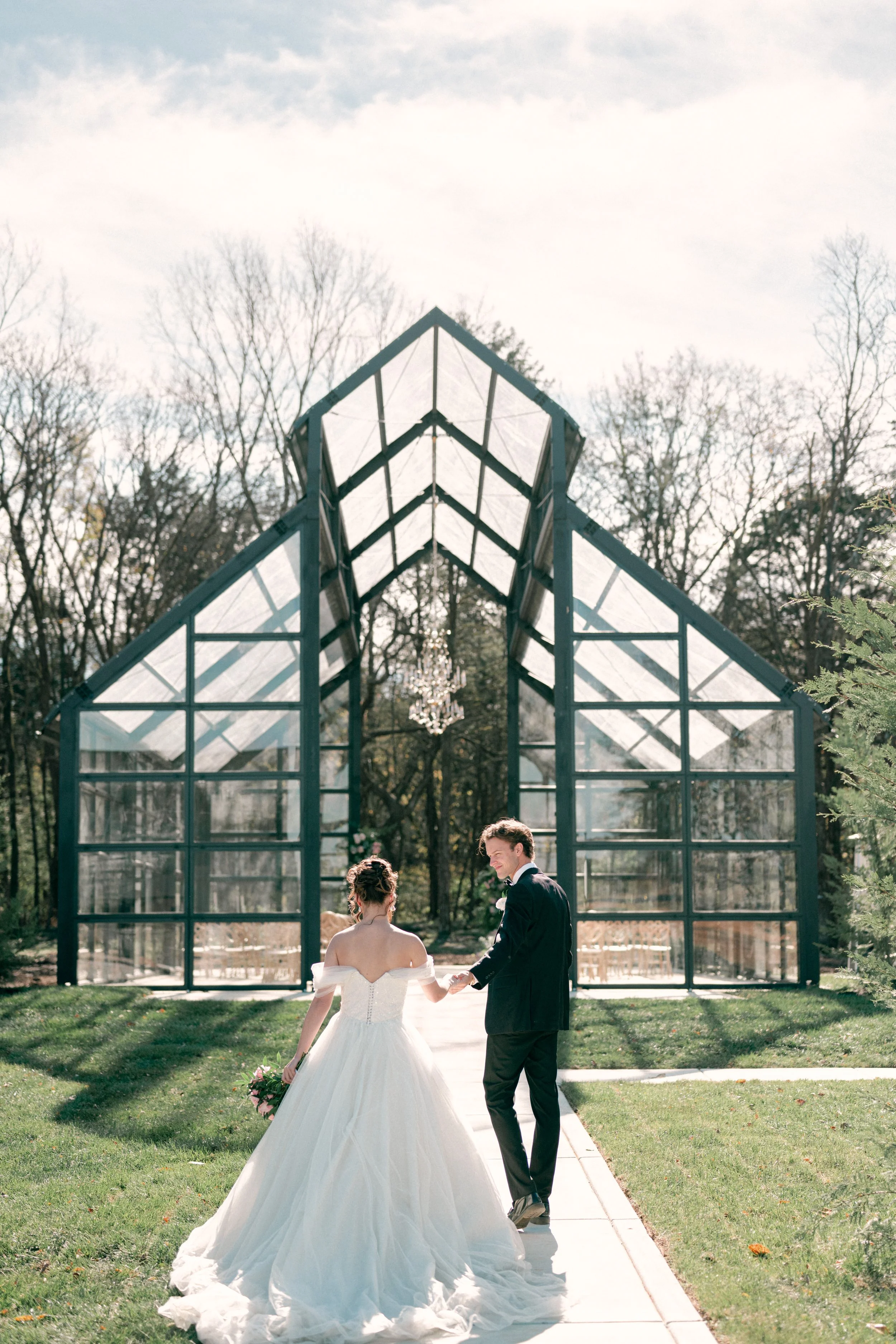 Wedding ceremony at the Glass Chapel at Jubilee Woods near Nashville, photographed by a Nashville wedding photographer