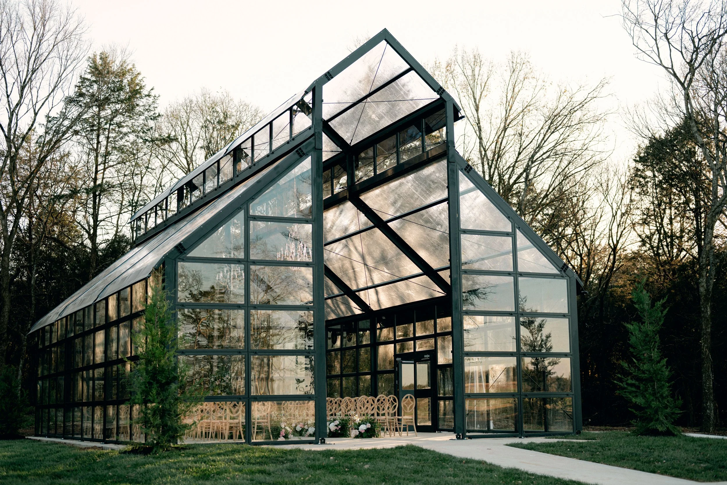 Wedding photos at Jubilee Woods showcasing the Glass Chapel ceremony space