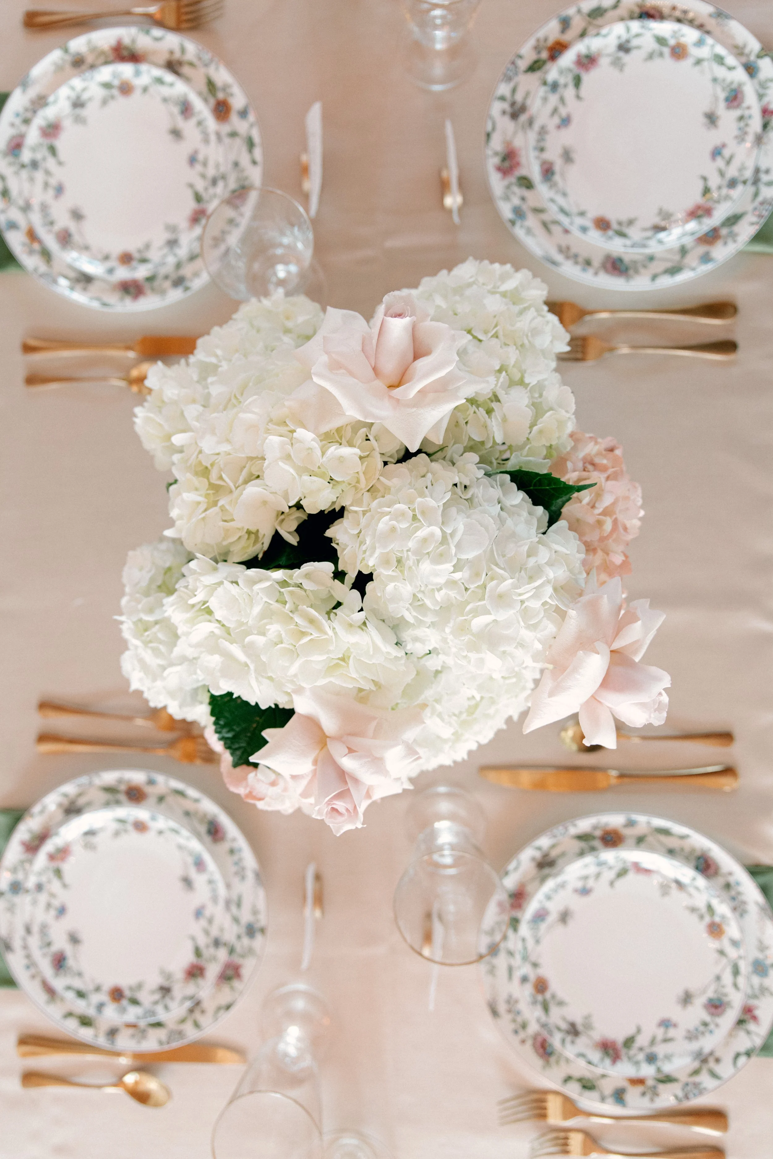 Cedar Hall reception table design at Jubilee Woods with floral arrangements