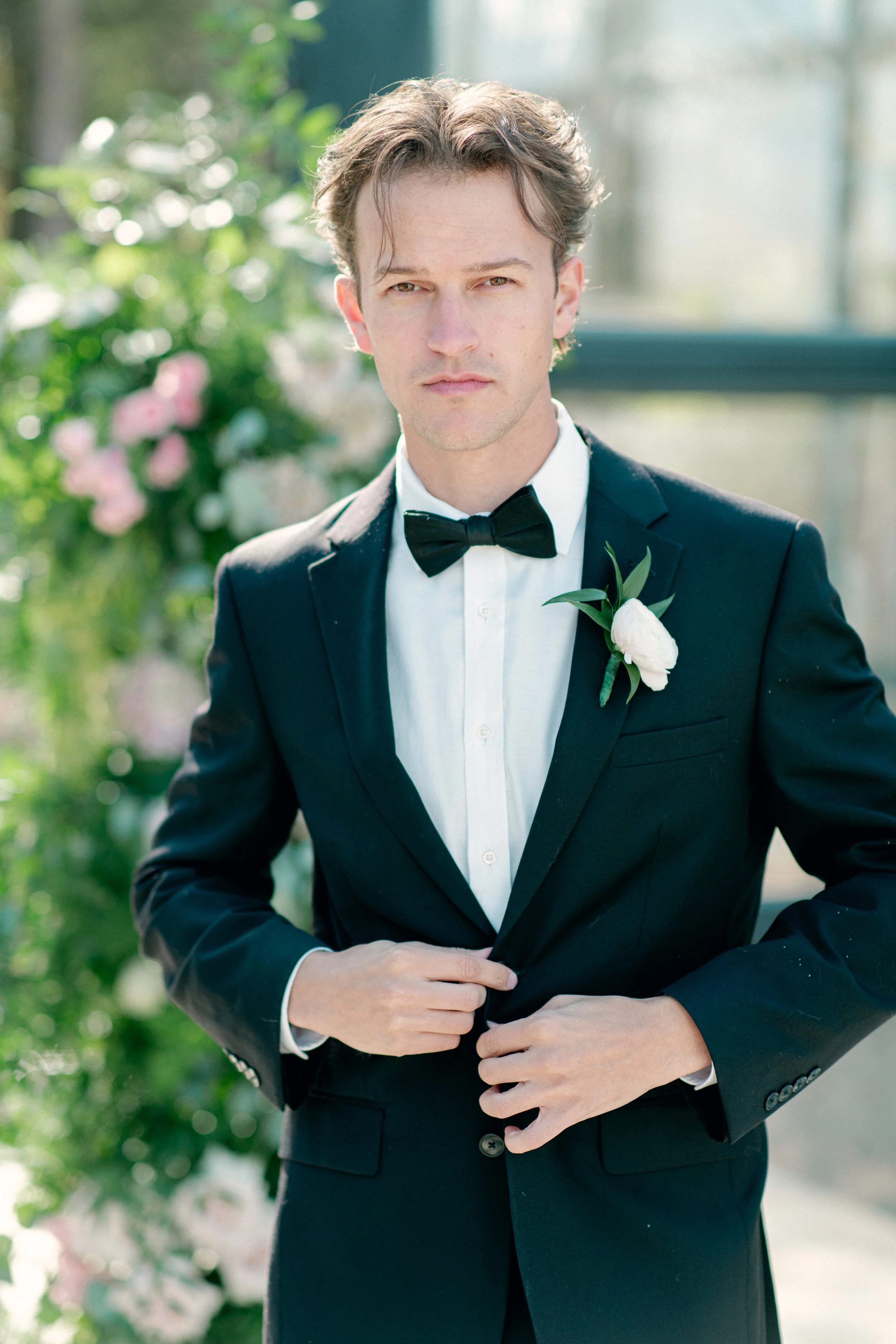 Groom portrait at Jubilee Woods wedding venue photographed in editorial style