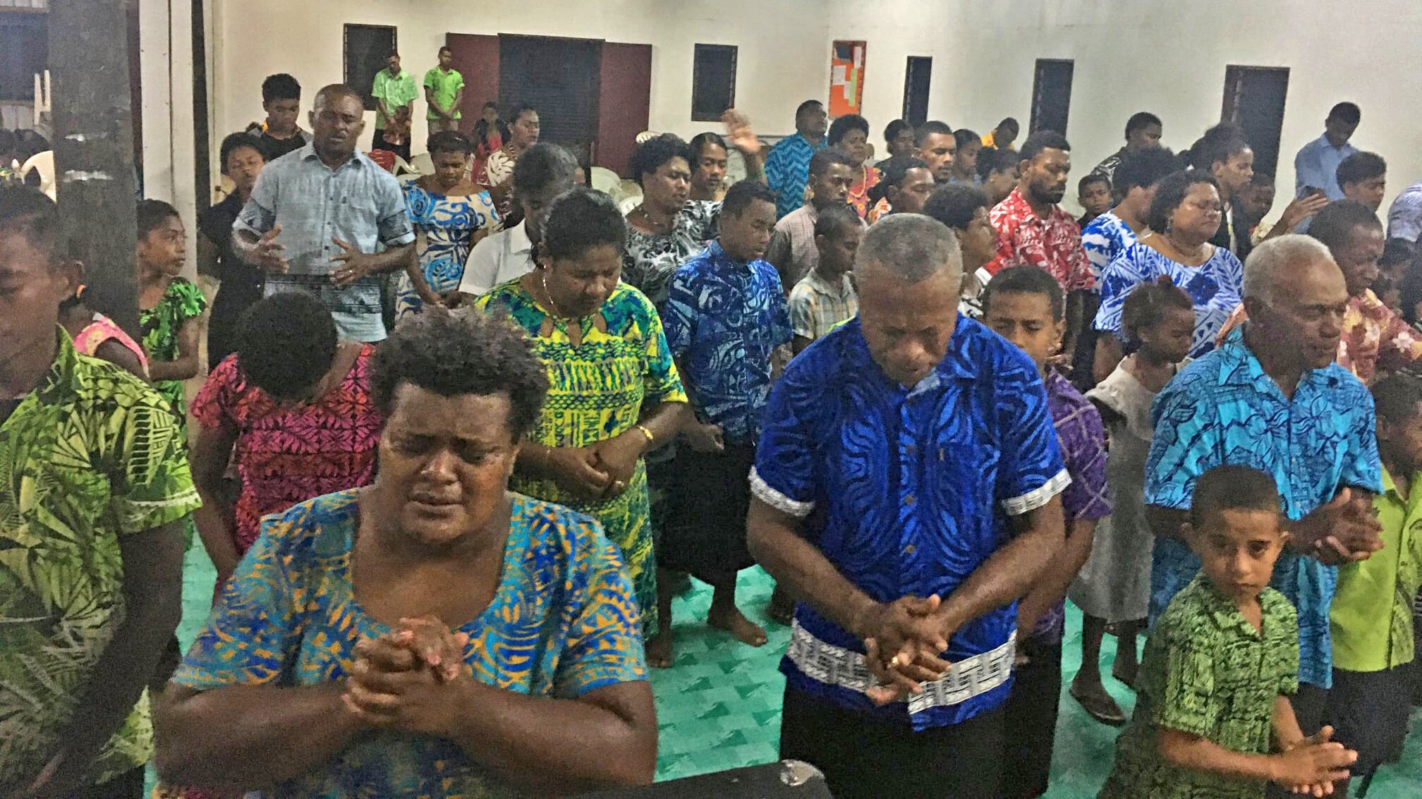 The church in Fiji praying for protection, for the storms to stop, and for God to use them to bless those impacted by the storms.