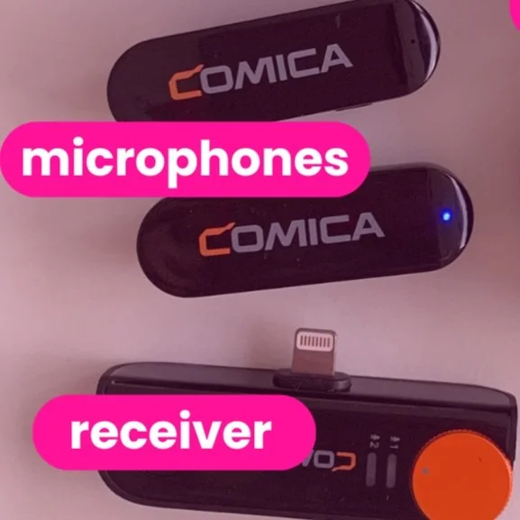 A close up photo of the Comica Vimo S mobile microphones and the receiver that connects to the phone.