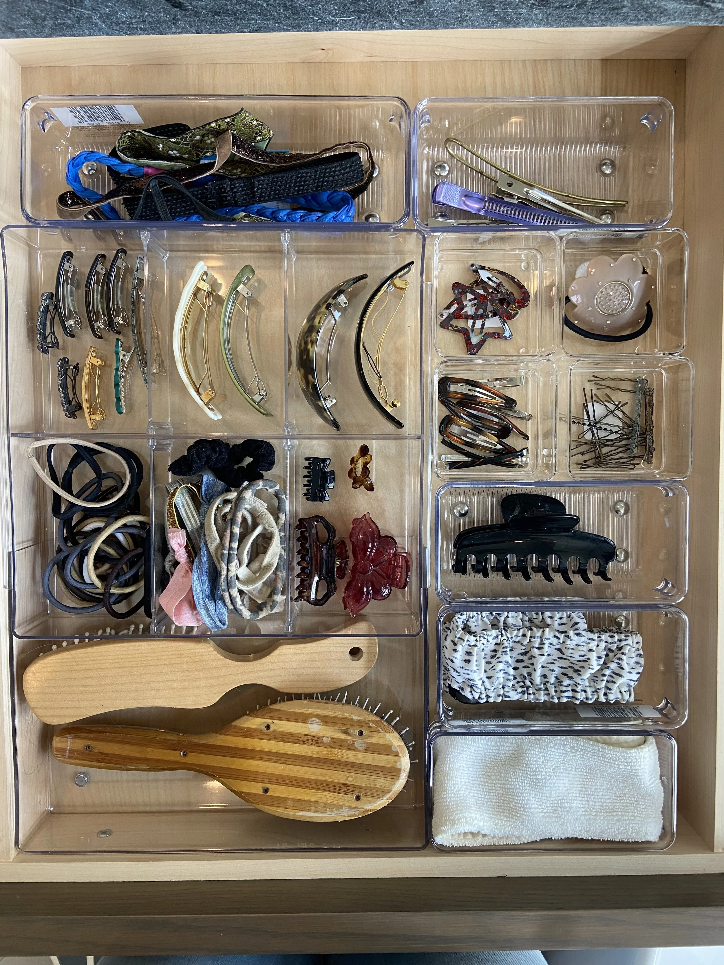 We turned this bathroom "throw anything in it" drawer into an organized space. Dividers can be so helpful and we know just where to find them.