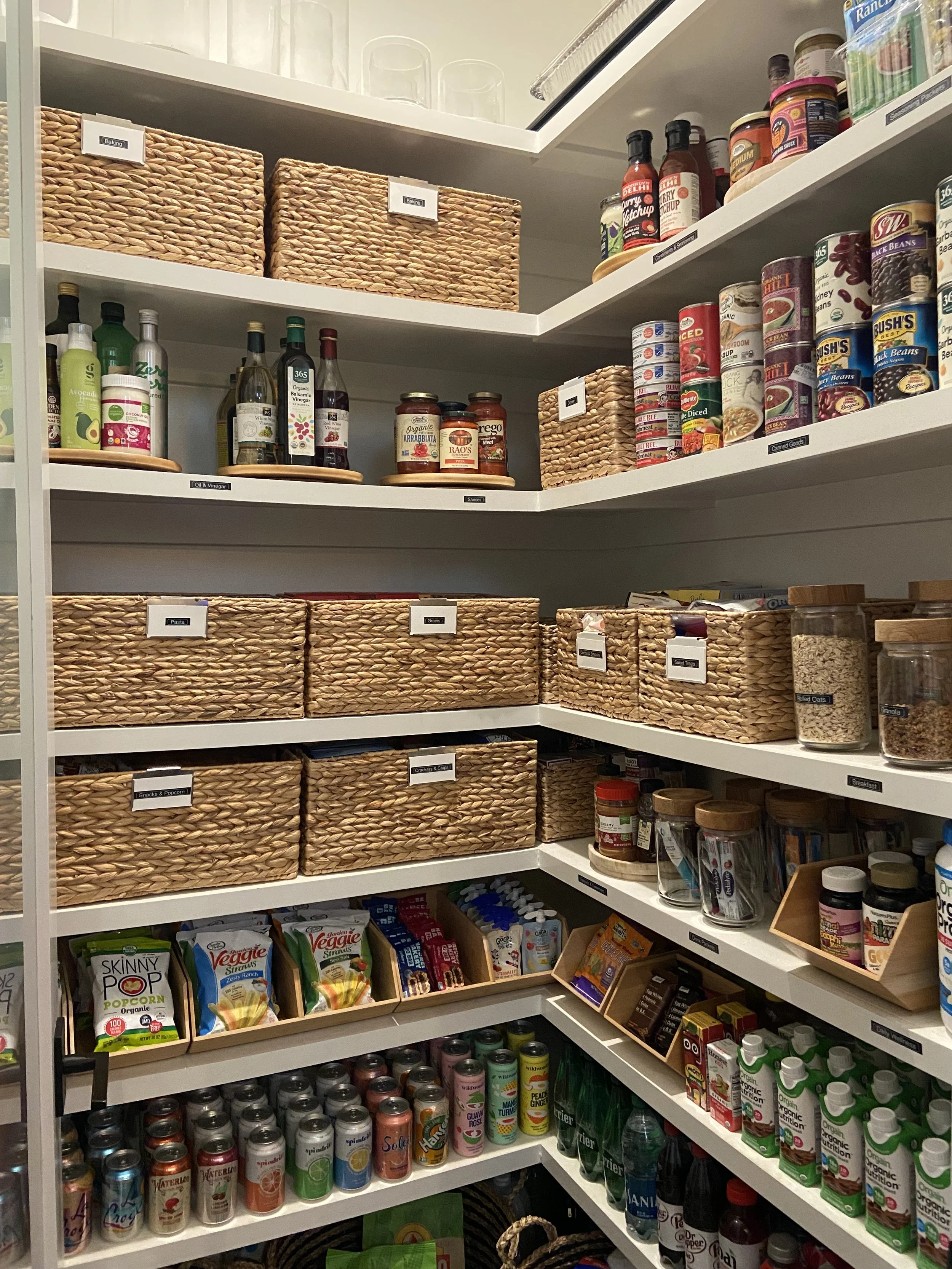 This pantry is a great example of exposed items and non exposed items. Some food items are naturally messy which is where they baskets can really help keep everything in their place.