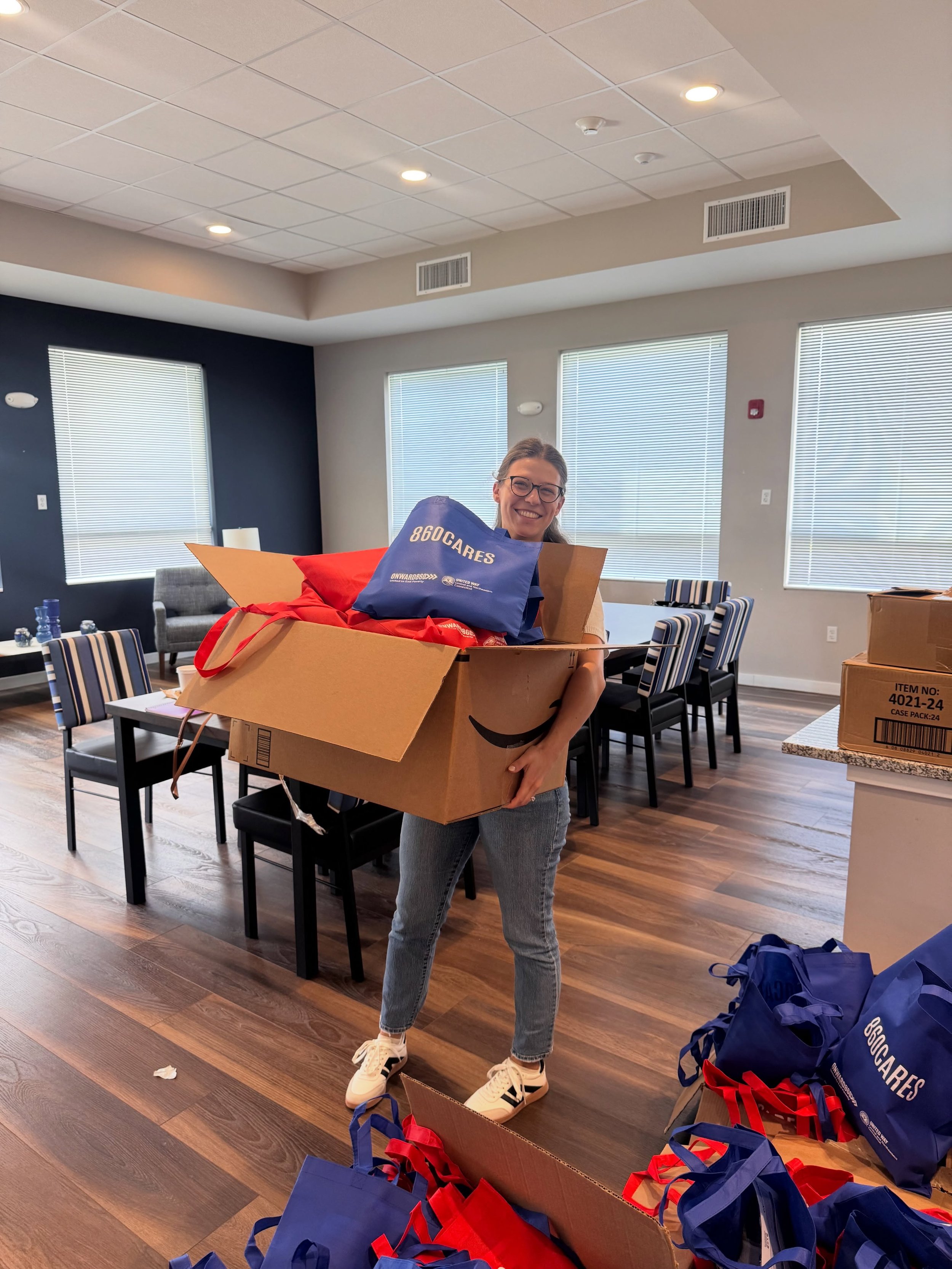 This is what HYPE is all about! 

Two of our incredible Leadership Committee members, recently teamed up to bring young professionals together over their lunch hour to assemble care packages supporting our neighbors through the Hartford Housing Autho