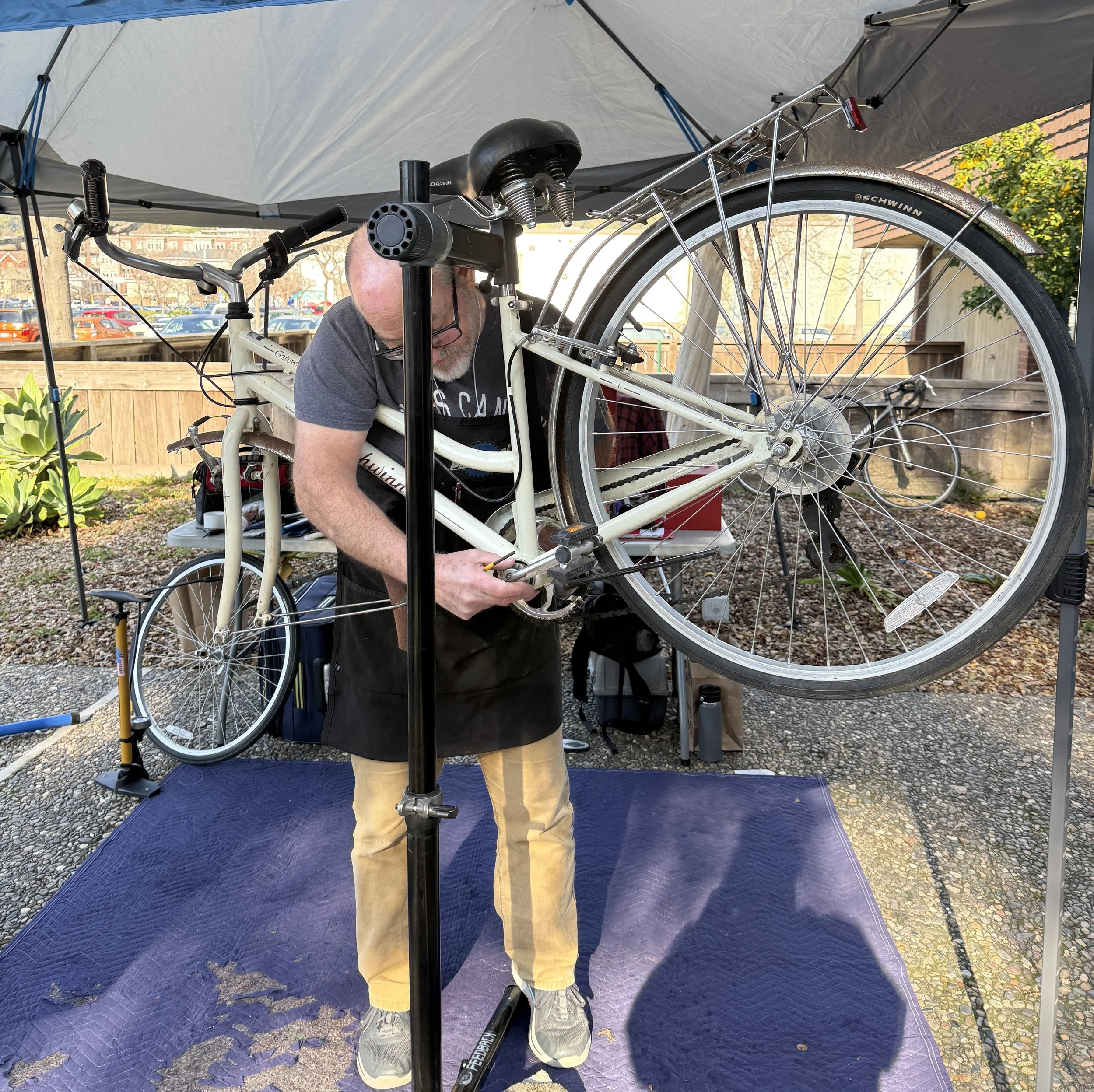 Man repairing bike