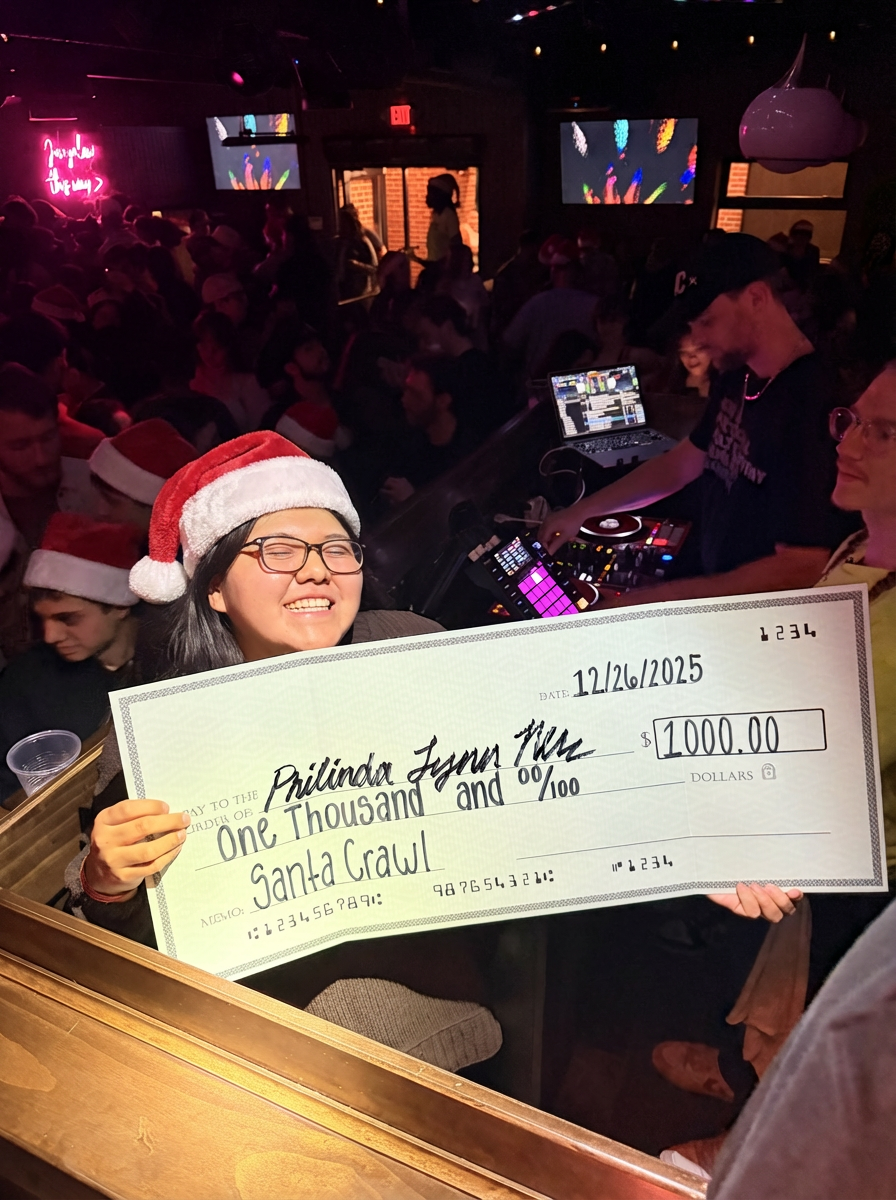 Santa hats in crowd.png