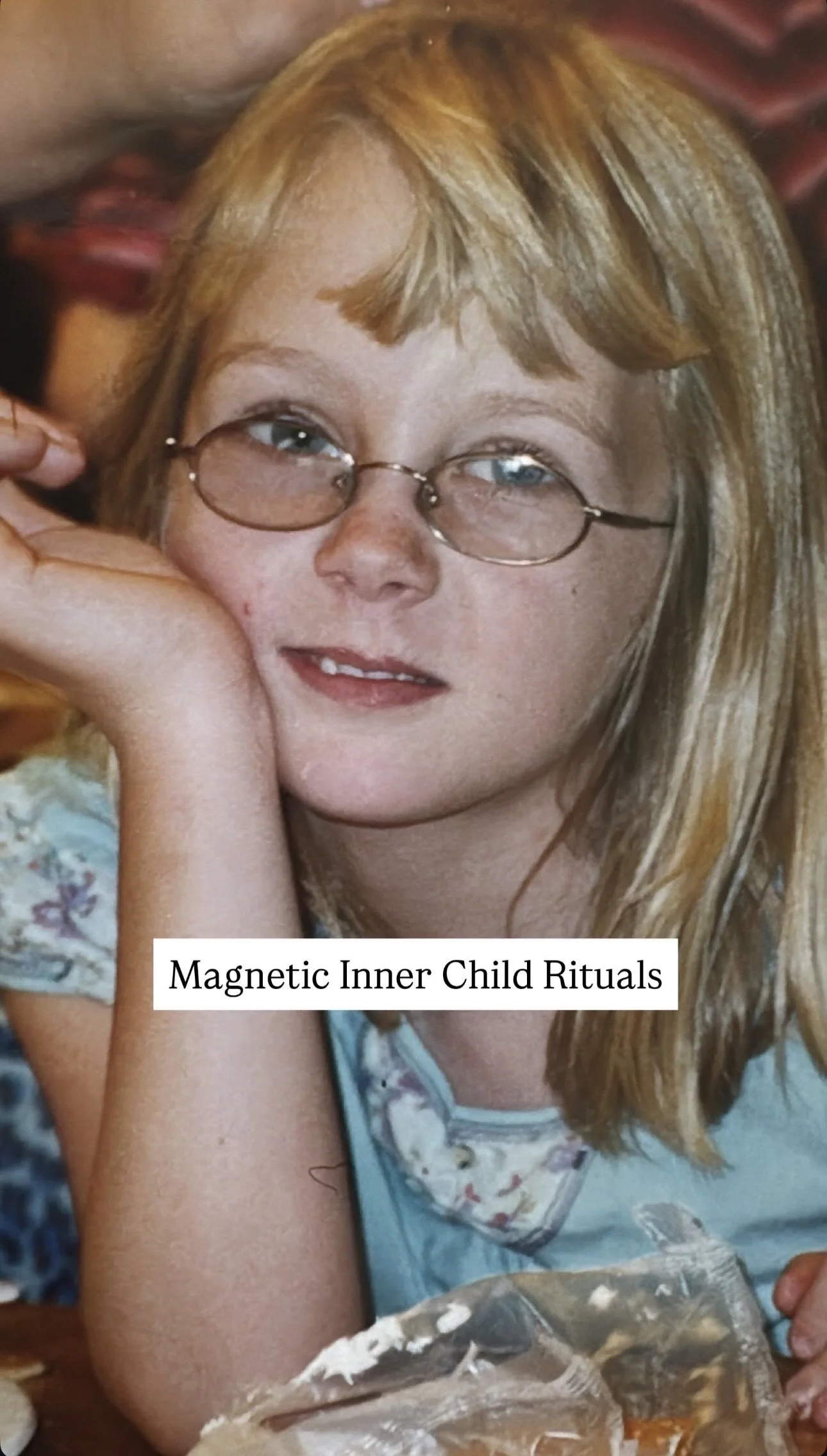 A young girl with blonde hair, glasses, and freckles, resting her head on her hand, with the text 'Magnetic Inner Child Rituals' over her chest.