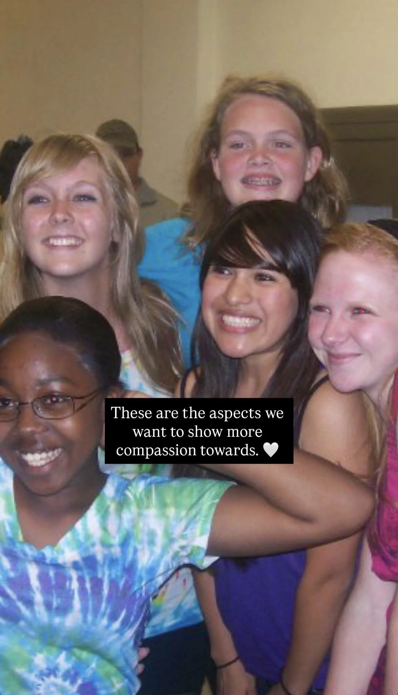 A group of smiling diverse young people taking a group selfie, with a caption saying 'These are the aspects we want to show more compassion towards.'