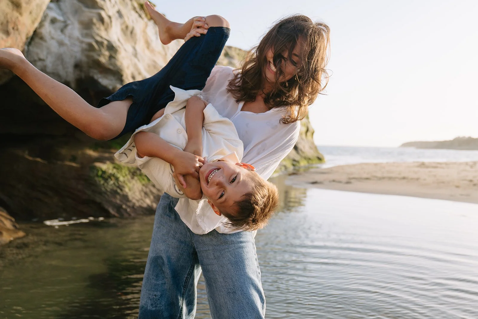 Boy smiling during family photo shoot at Natural Bridges