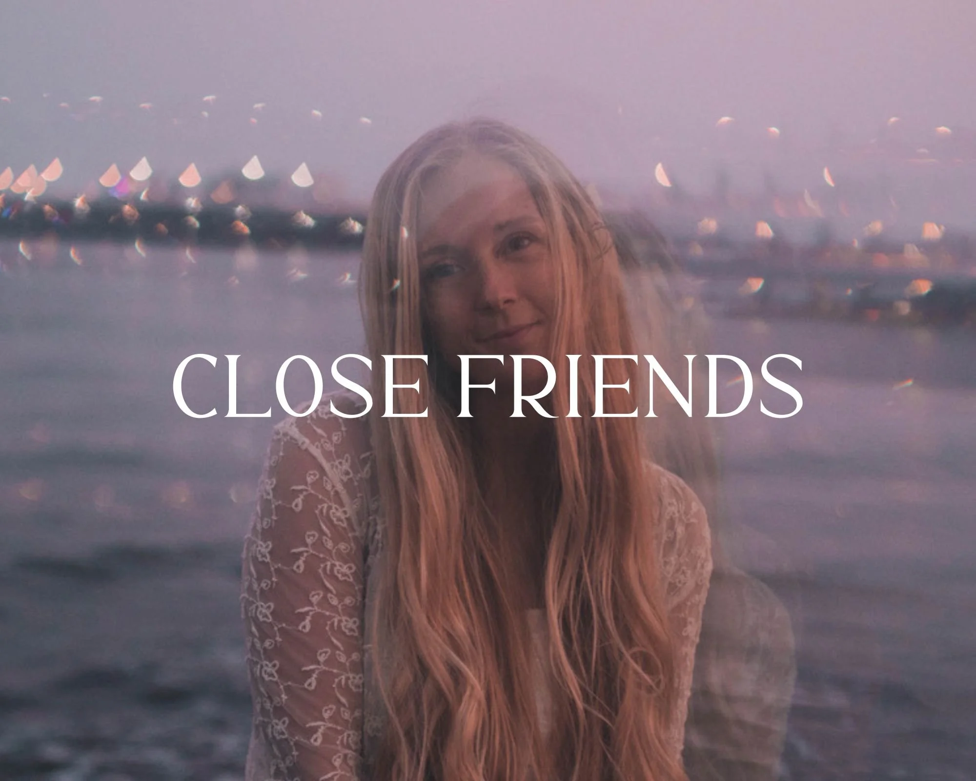 A woman with long, wavy hair looking towards the camera, with a blurred cityscape and water in the background during sunset. The text "Close Friends" is overlaid on the image.