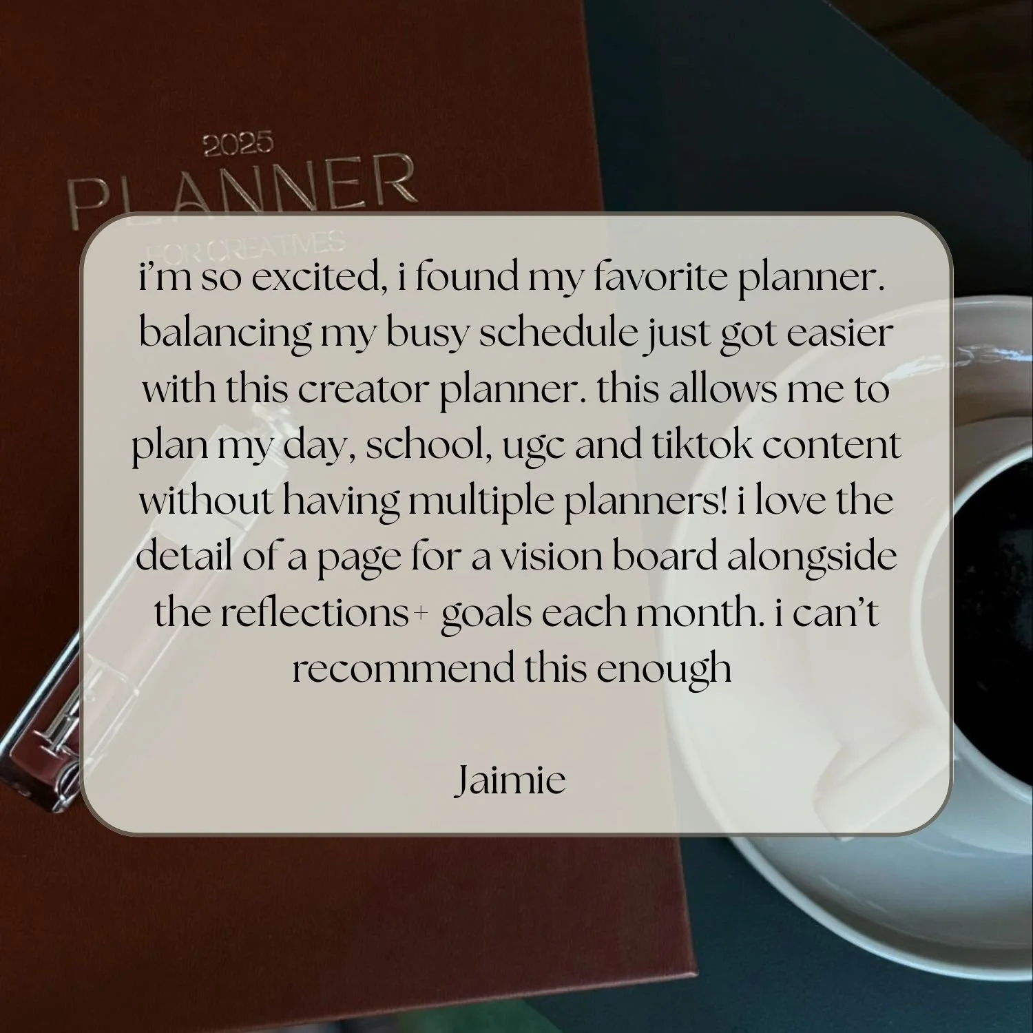 A note with a positive review of a planner, placed on a desk next to a brown planner book, a cup of coffee, and a pen.