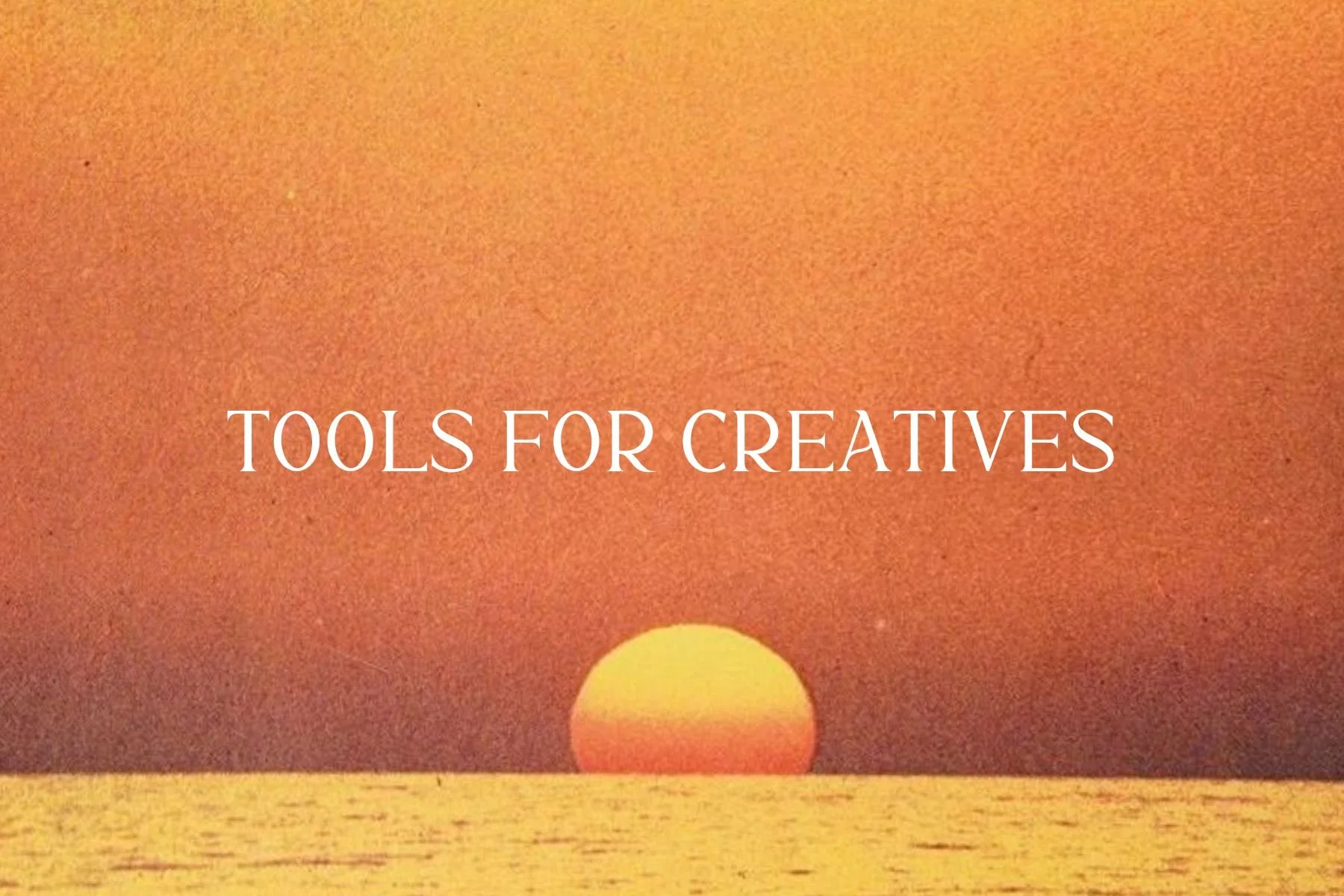 Sunset over the ocean with the text "Tools for Creatives" in the center.