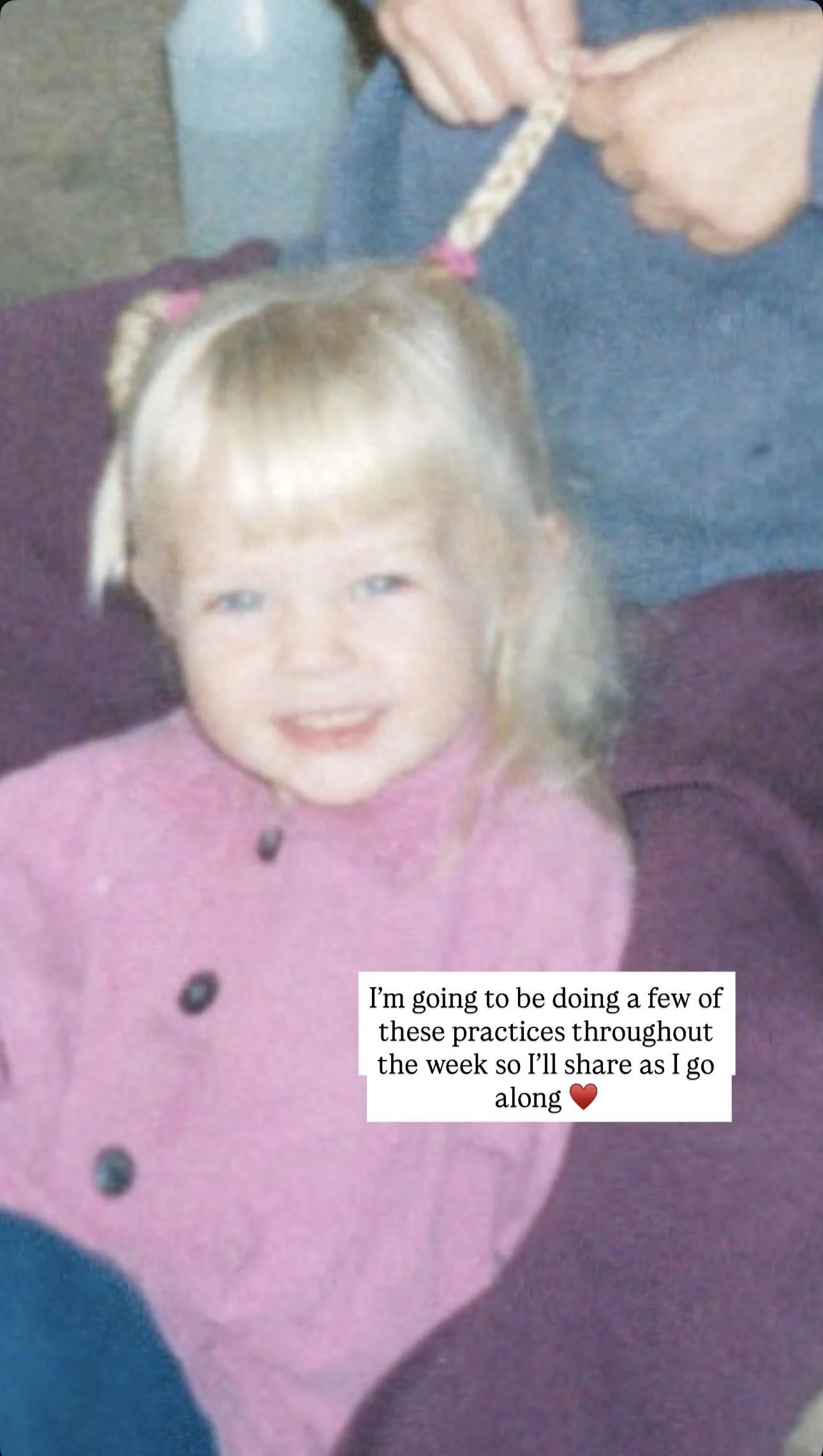 A young blonde girl with blue eyes wearing a pink coat, smiling, with a person tying her hair with a braid in a practice or tutorial setting, as indicated by the text overlay about sharing practices.