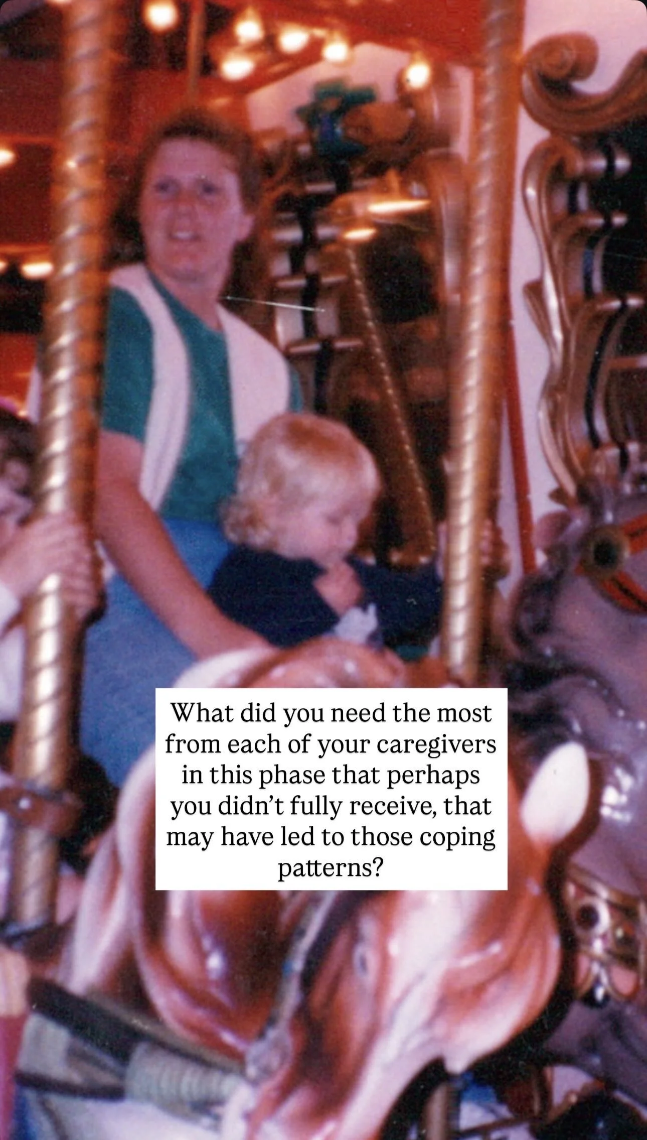 A woman and a small child on a carousel ride, with warm lighting and ornate wooden details.
