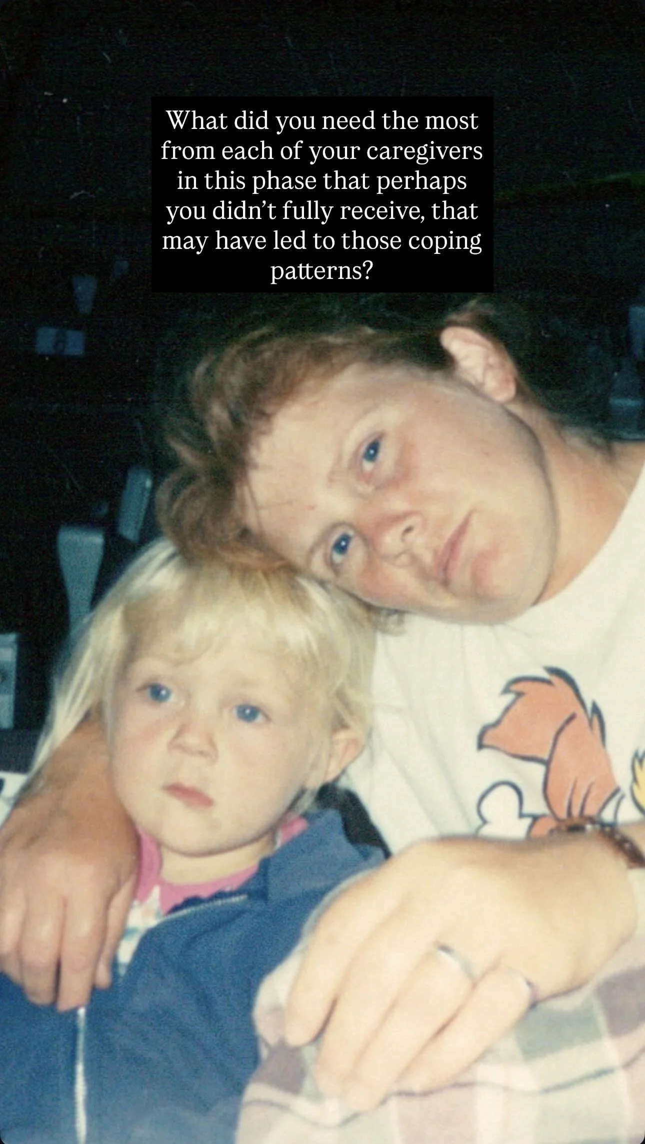 A man with brown hair and a woman with blonde hair and blue eyes, holding a young girl with blonde hair and blue eyes, in a close-up photo. The woman has her arm around the girl, and the man is leaning close to both of them, with a thoughtful express