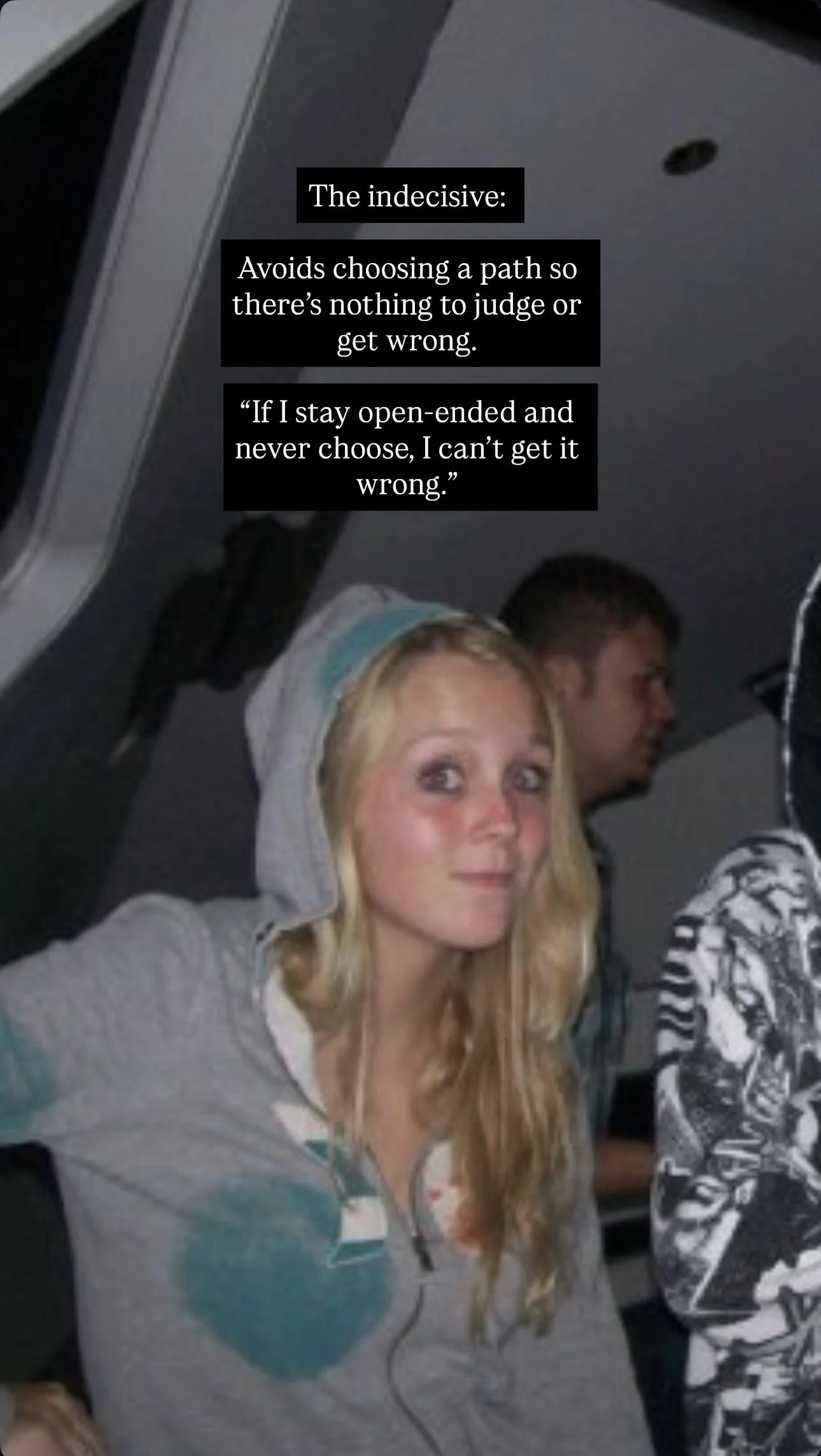 A woman with long blonde hair wearing a gray hoodie with teal accents, looking at the camera with a subtle smile. In the background, a man with short brown hair wearing a patterned hoodie, looking to the side. Text overlay discusses the concept of be