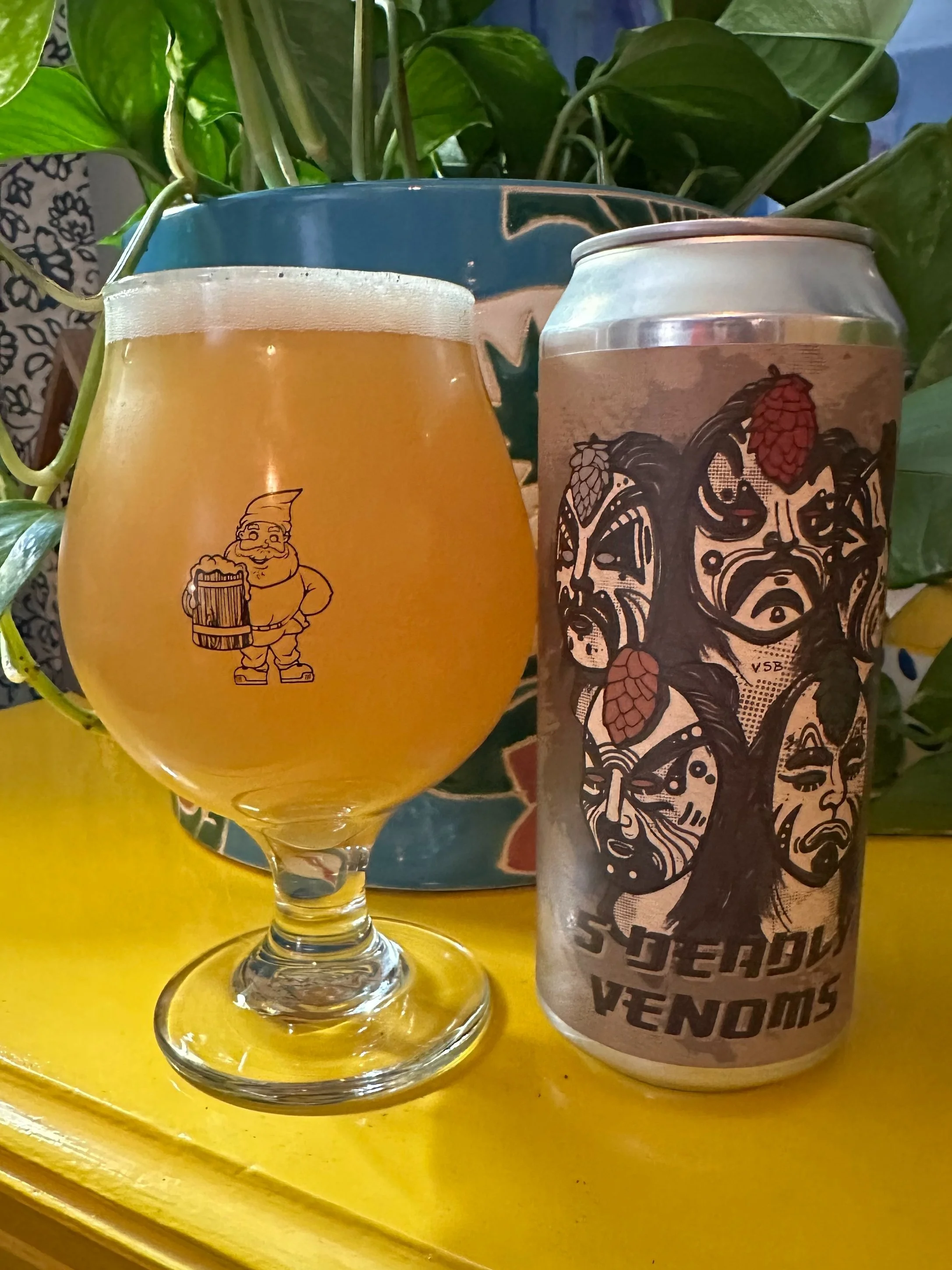 Beer in a glass with can art