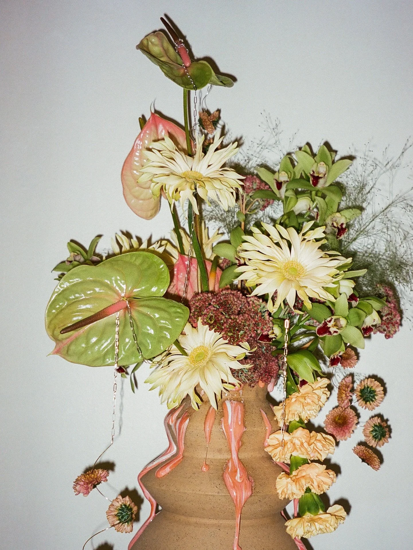 DiRT 2025 on film 〰️ @bestbudfloral @artschoooldropout and @shop.ayi put on this amazing show teaming up florists and ceramic artists! (Already brainstorming more temporary art installs and experimenting for next year)
•
scan and dev: @imstill.d