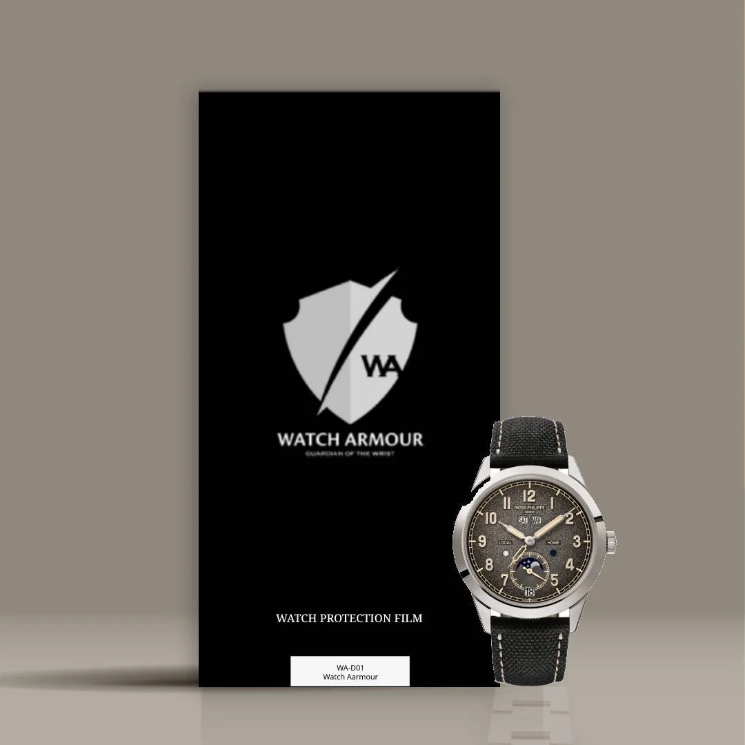 Watch Armour watch protection film packaging in black box with white shield logo and a wristwatch with a black strap in front.