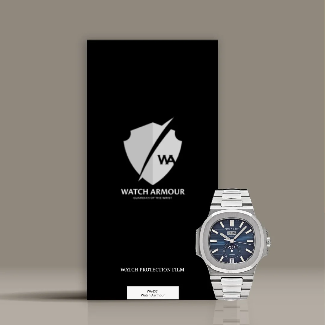 A watch protection film packaging from Watch Armour with a silver Patek Philippe wristwatch displayed to the right of the package. The packaging is black with the Watch Armour logo and text, and the watch has a dark blue face and silver band.