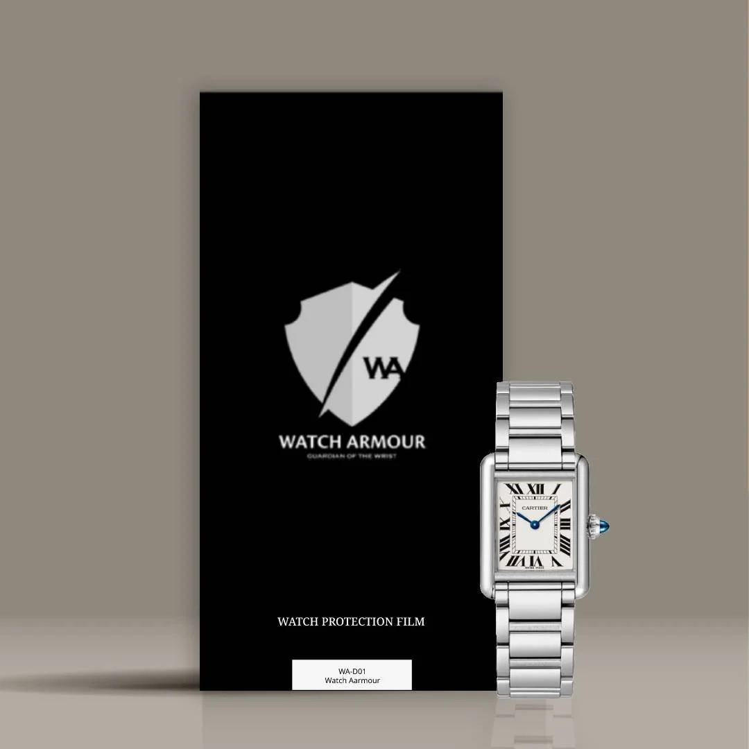 A silver Cartier wristwatch placed in front of a black Watch Armour packaging box. The box features a shield logo with a lightning bolt and the text "WATER ARMOUR" and "GUARDIAN OF THE WRIST." The watch has a rectangular face with Roman numeral markers, blue sword-shaped hands, and a small crown with a blue gemstone on the side.