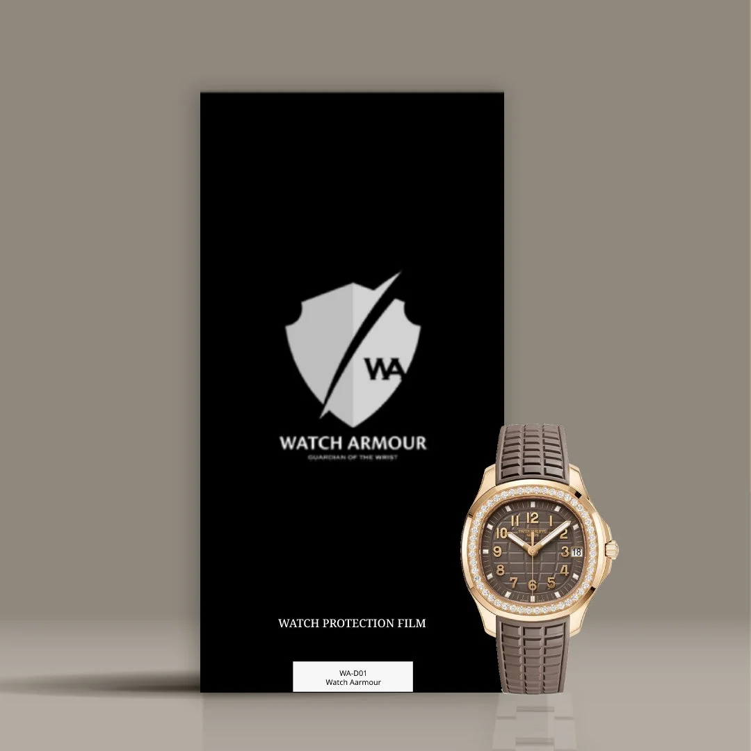 A watch protection film packet with the Watch Armour logo and a gold wristwatch with a diamond-studded bezel and a brown strap in front of the packet.