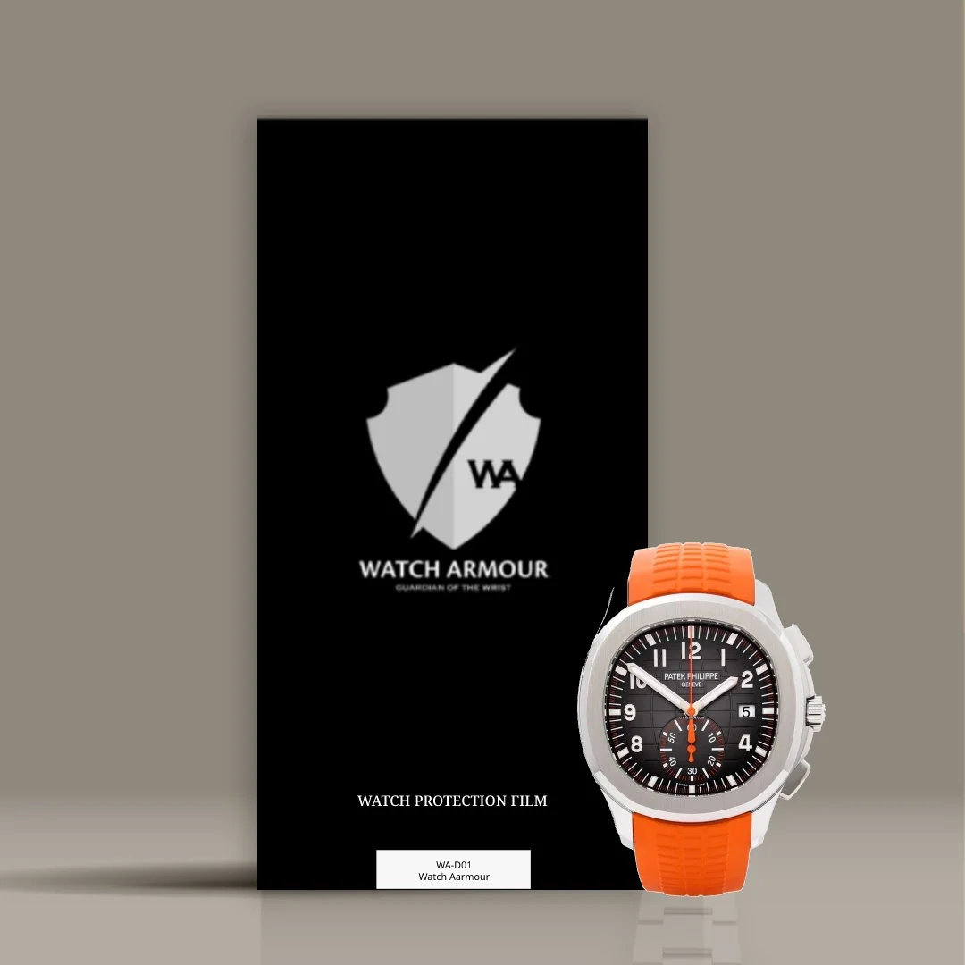 A Patek Philippe wristwatch with an orange strap next to a black Watch Armour protection film package.