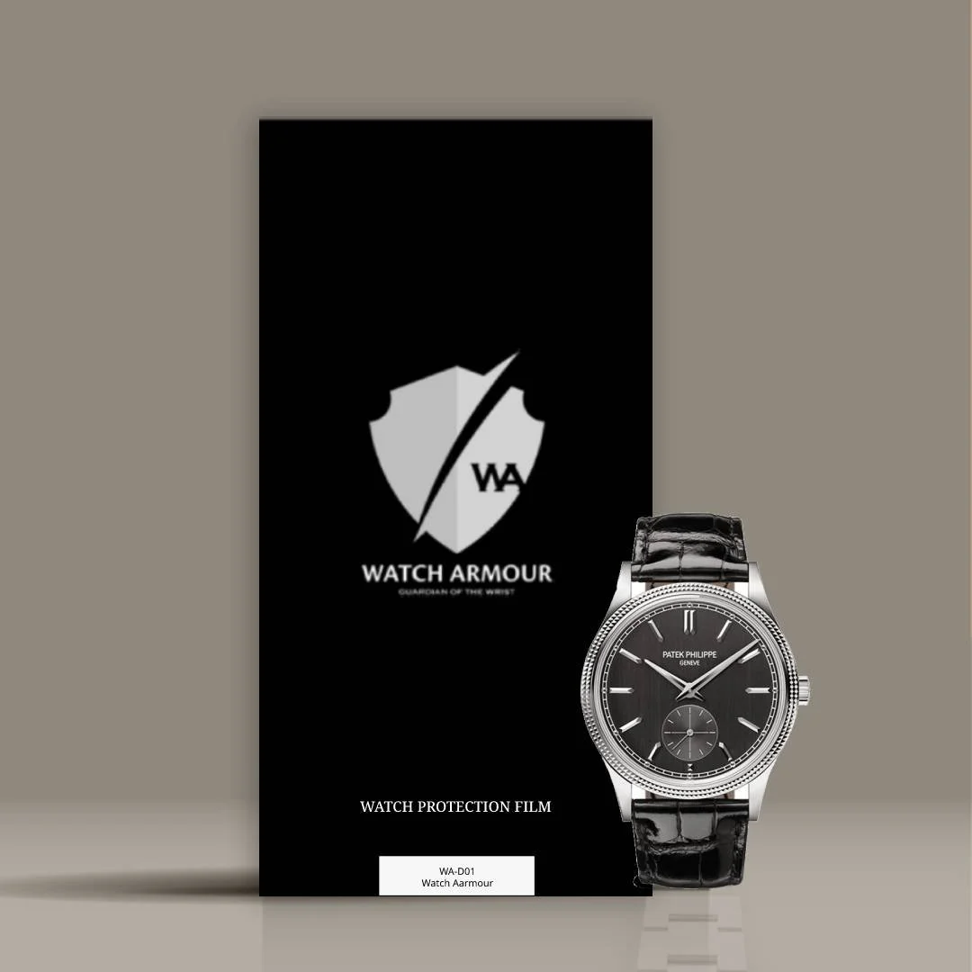 A black Watch Armour protection film package with a white shield and lightning bolt logo, placed next to a luxury black and silver Patek Philippe wristwatch with a black leather strap.