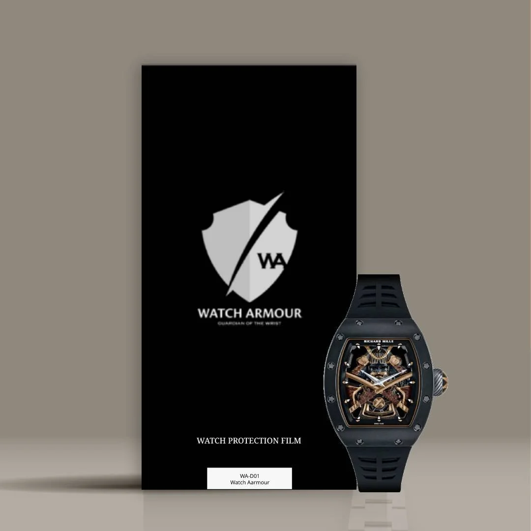 A black watch protection film package from Watch Armour with a large watch placed in front. The package features a shield logo with the words "WATCH ARMOUR" and "GUARDIAN OF THE WRIST." The watch has a dark band and a detailed, skeleton-style face showing intricate internal mechanics.