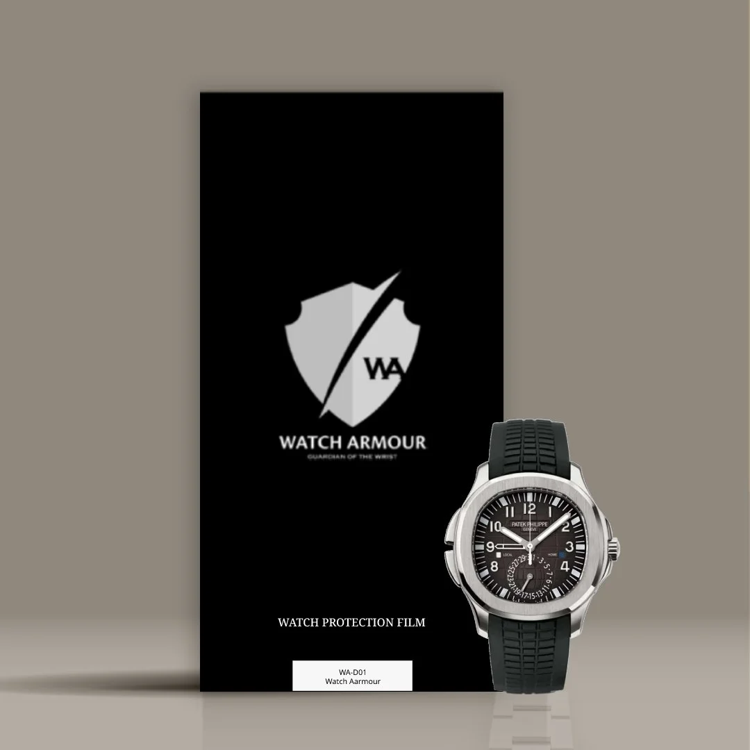 A wristwatch with a black strap and silver case displayed in front of a black packaging box with a shield logo and the text 'WATCH ARMOUR' and 'GUARDIAN OF THE WRIST'