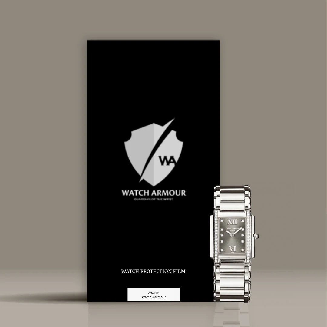 A silver wristwatch with a rectangular face and Roman numerals, placed next to a black Watch Armour protection film package with a shield logo and the words 'WATCH ARMOUR' and 'WATCH PROTECTION FILM' printed on it.