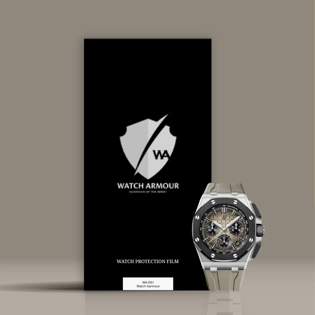 A luxury chronograph watch with a metallic band and black bezel, displayed in front of a black shield-shaped Watch Armour protective film packaging.