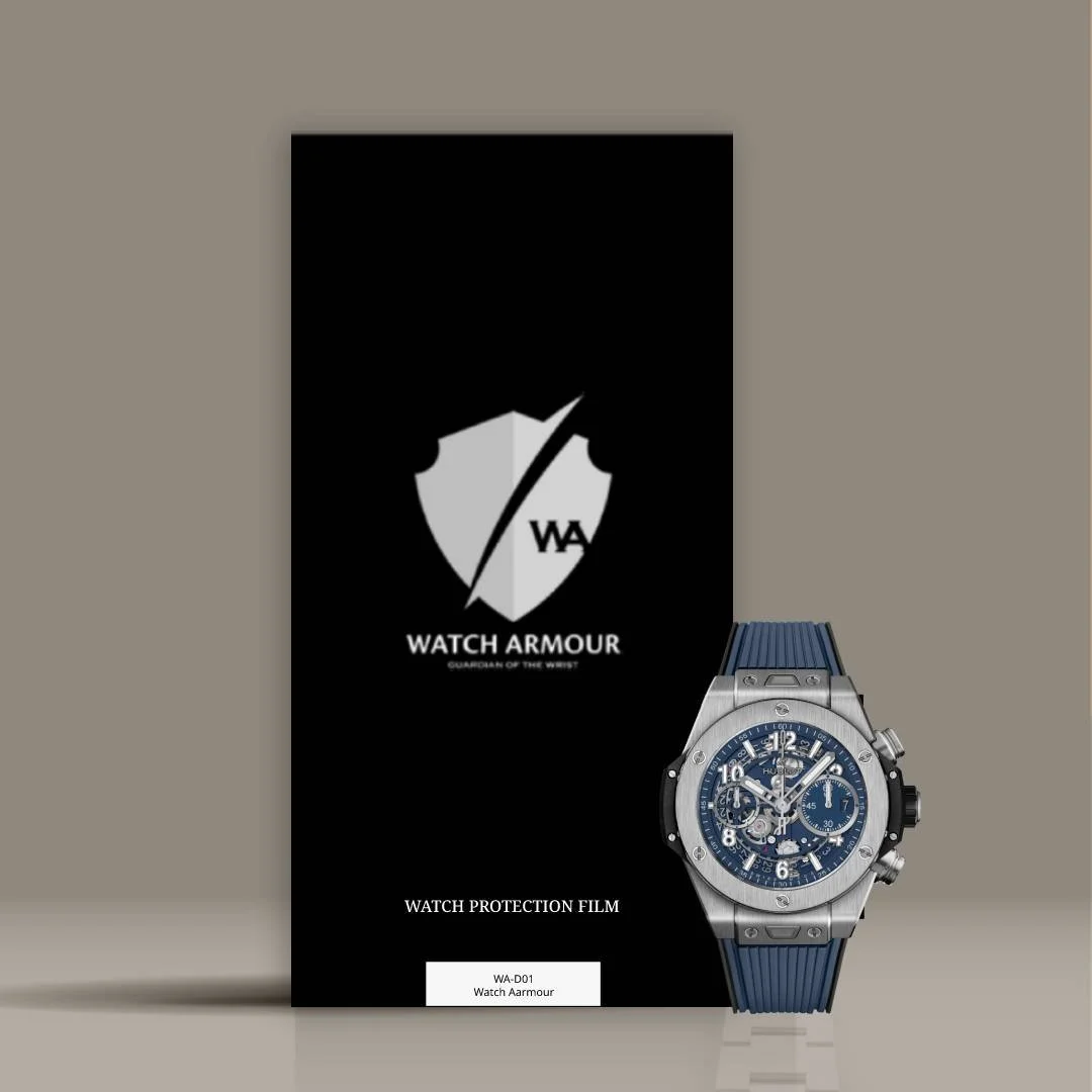 Watch protection film packaging with a blue sports watch placed in front of it. The packaging is black with a silver shield logo and text indicating Watch Armour. The watch features a blue strap and a detailed dial.