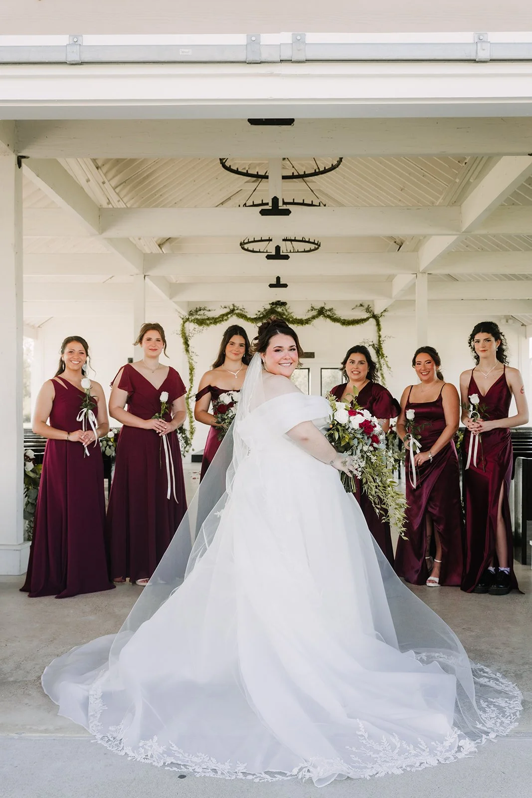 A bride with her bridesmaids at Still Waters Ranch venue in Alvin, TX, just south of Houston, TX