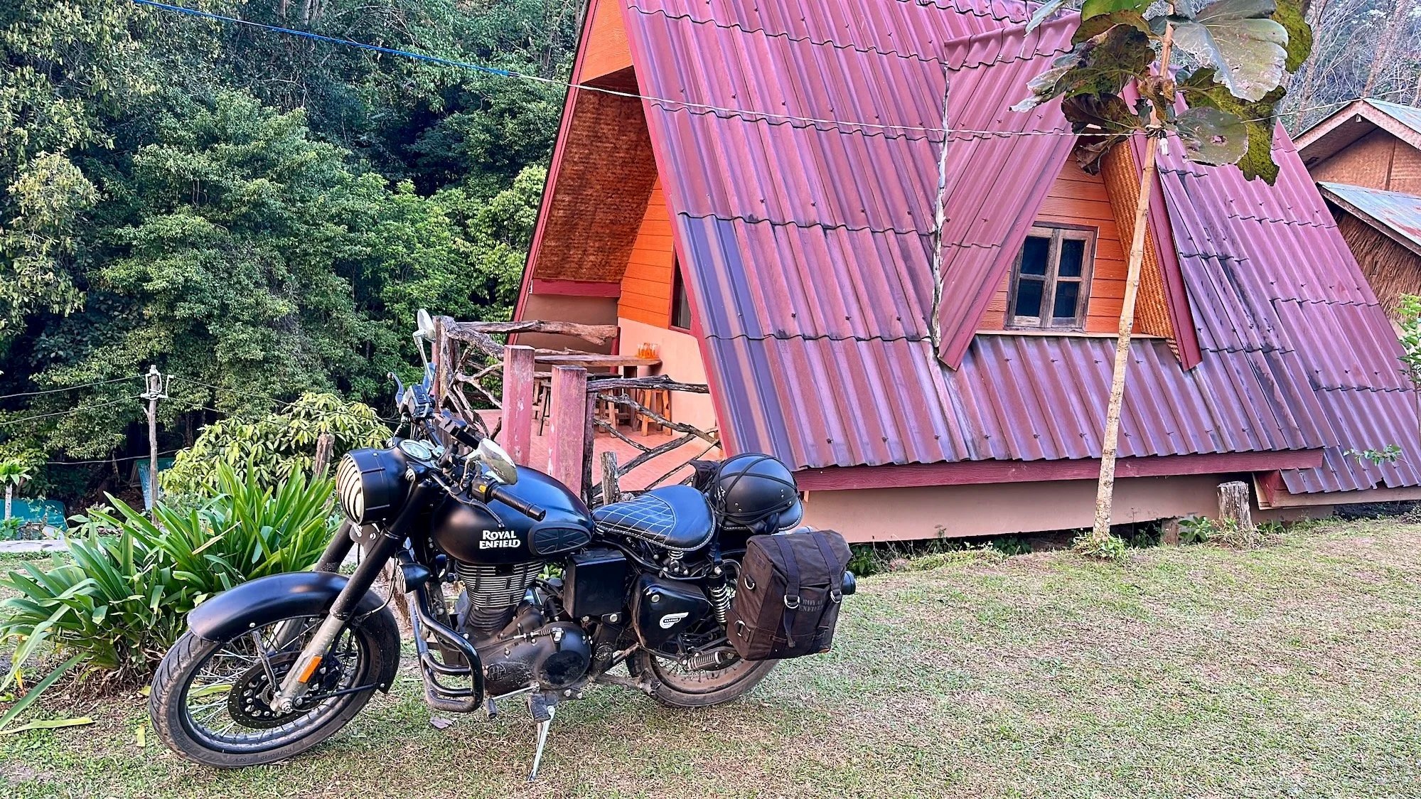 The author's motorcycle parked outside his cottage for the night.