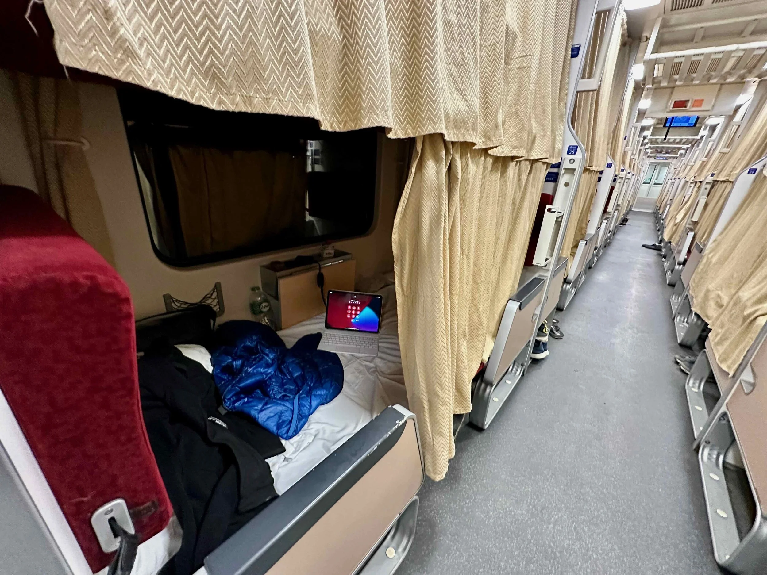 My sleeping berth in the train carriage.