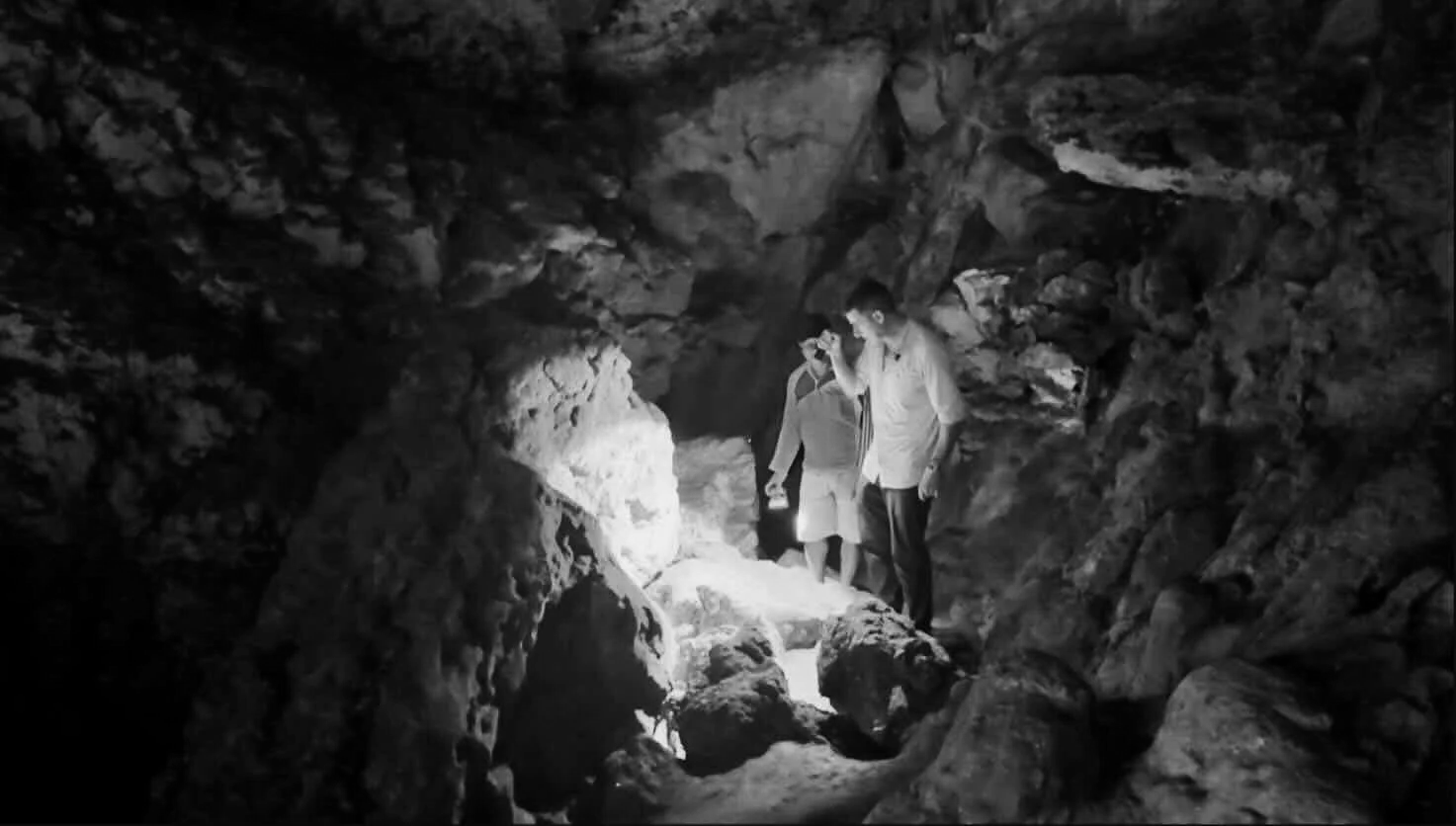 The author in the cave with his guide.