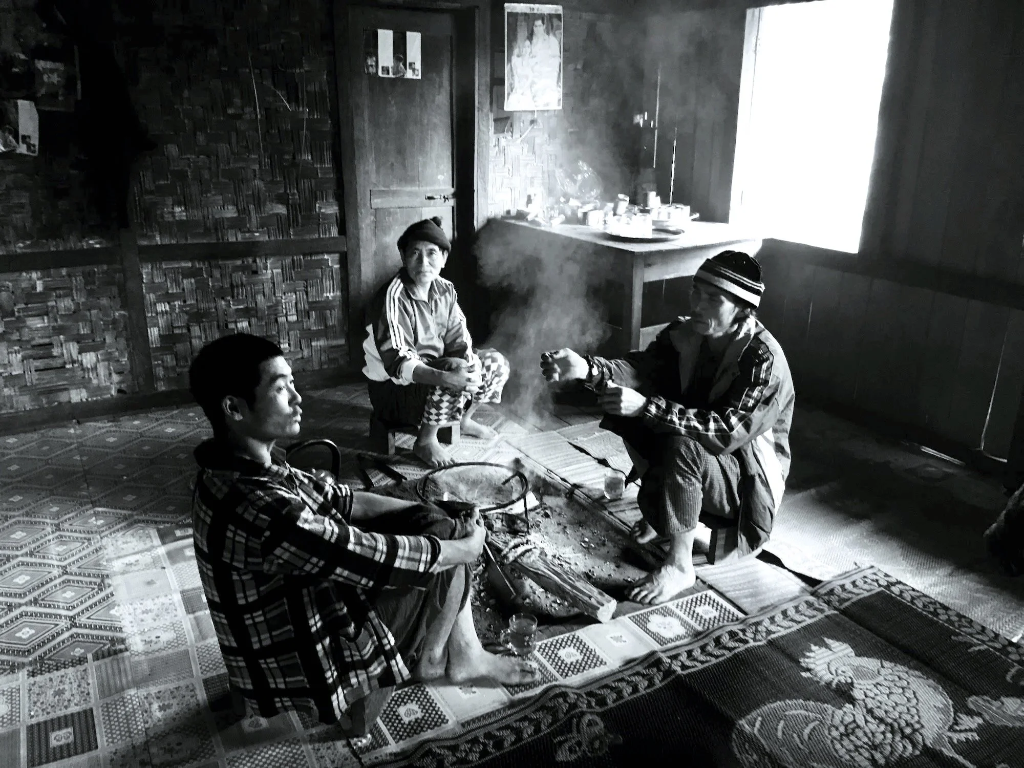 Local guys sitting around the fire.