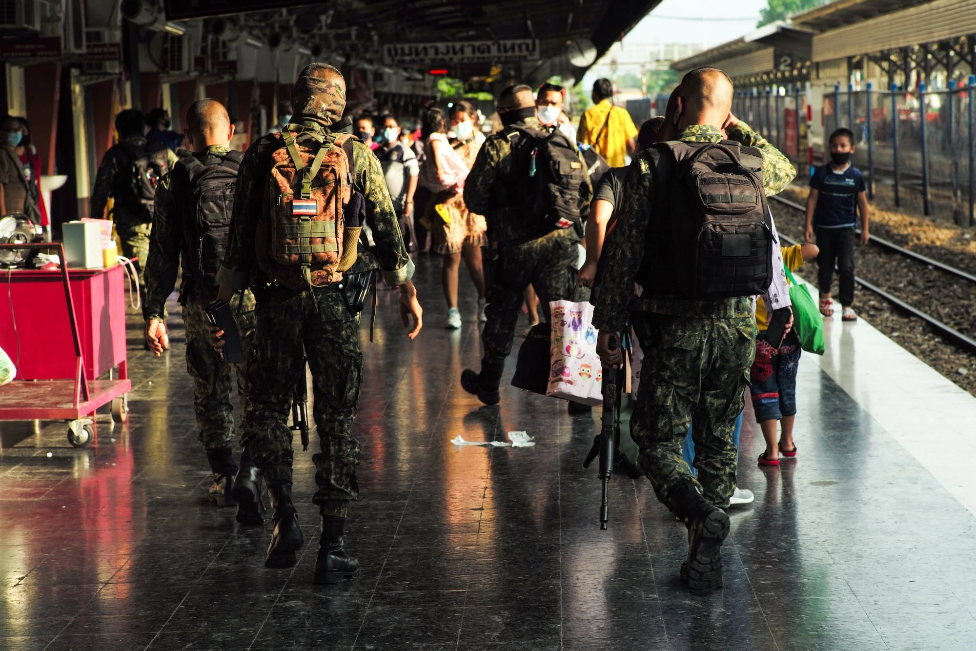 Soldiers on the train platform at Hat Yai station.