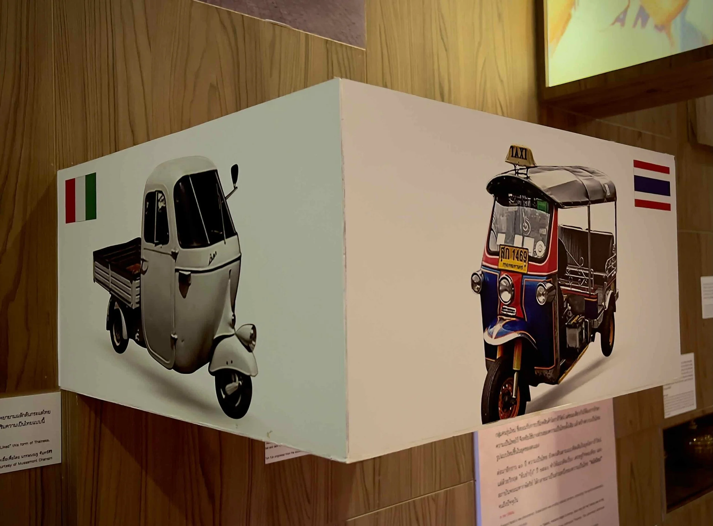Display showing the original Italian grandfather of the tuk-tuk.
