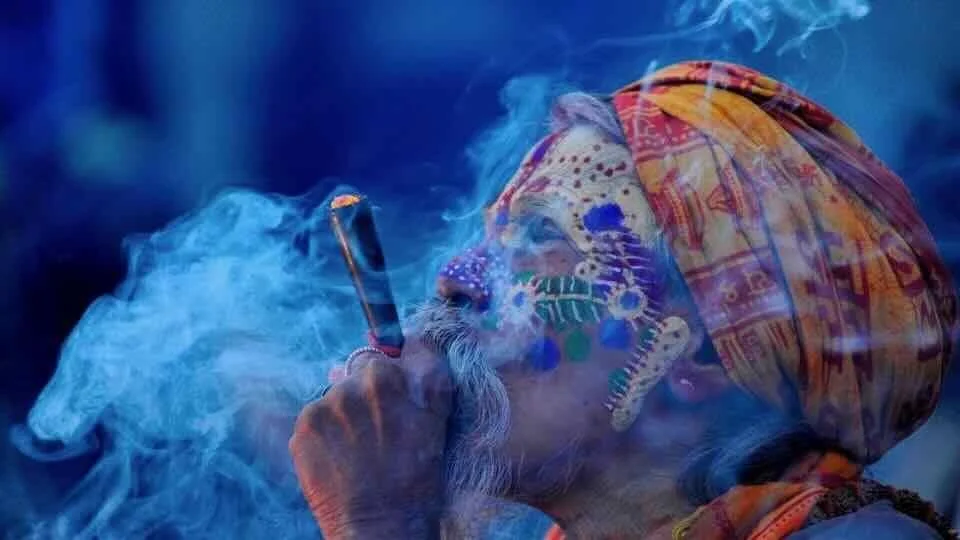 Indian holy man smoking cannabis.